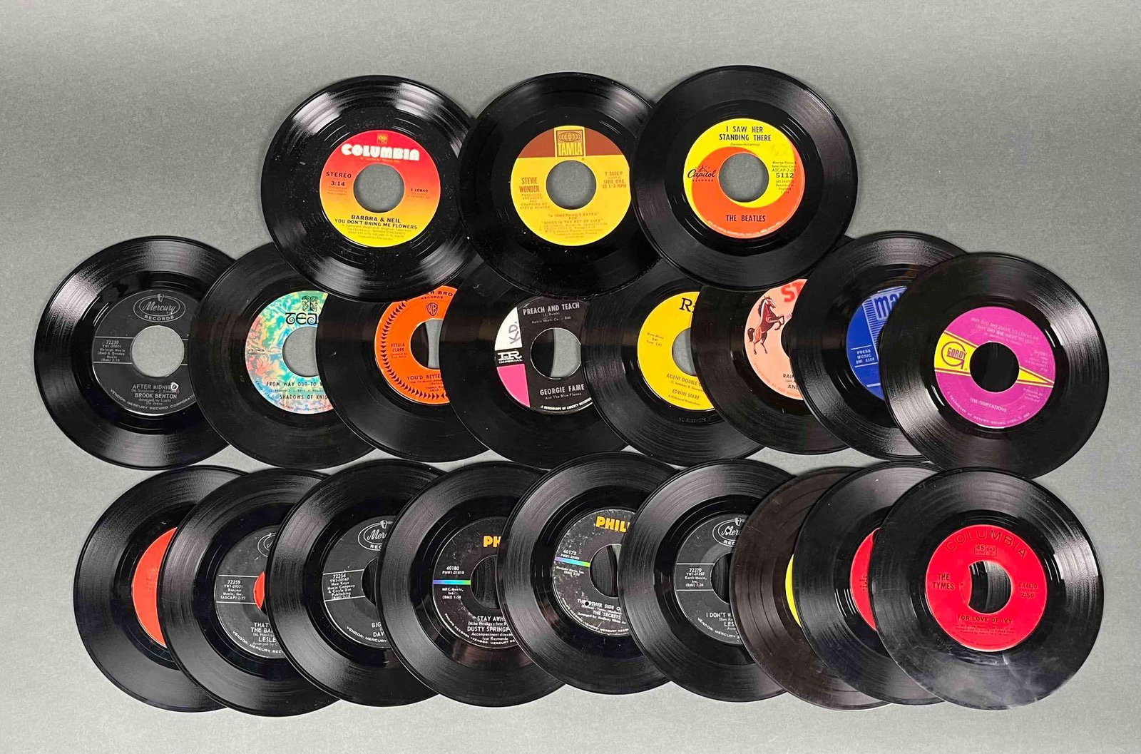 Lot of 20 Vintage 45 RPM Records: 20 Vintage 45 RPM records. All records are in fair condition. Records show signs of wear commensurate with age. Please see photos for additional details. Lot includes: Barbara Neil Stevie Wonder The B