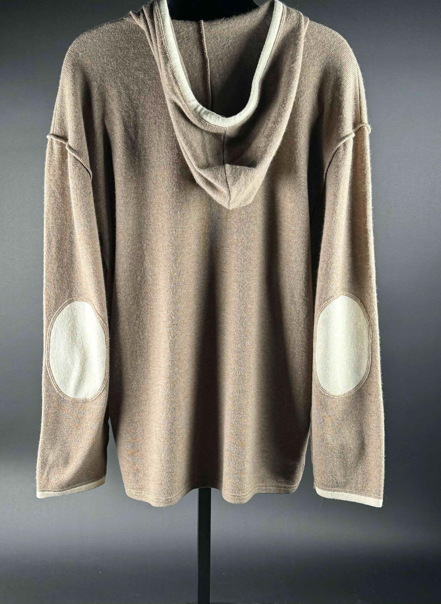 Nancy Heller Cashmere Hoodie: 100% cashmere sweater by Nancy Heller for Saks Fifth Avenue in colors light brown and cream. Made in Hong Kong. In good condition. Please see photos for additional details. Dimensions: Size S in US | 