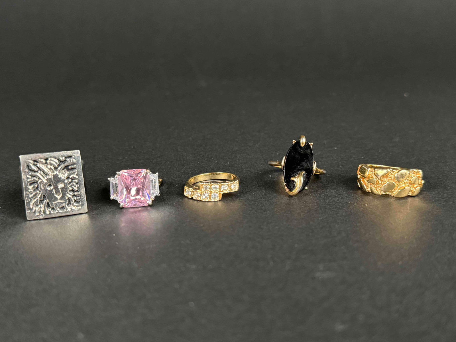 Lot of 5 Vintage Rings: Vintage rings, most with no markings. 1 vintage ring marked "Avon." All in excellent condition. Please see photos for details. Please note all lots show signs of wear commensurate with age and