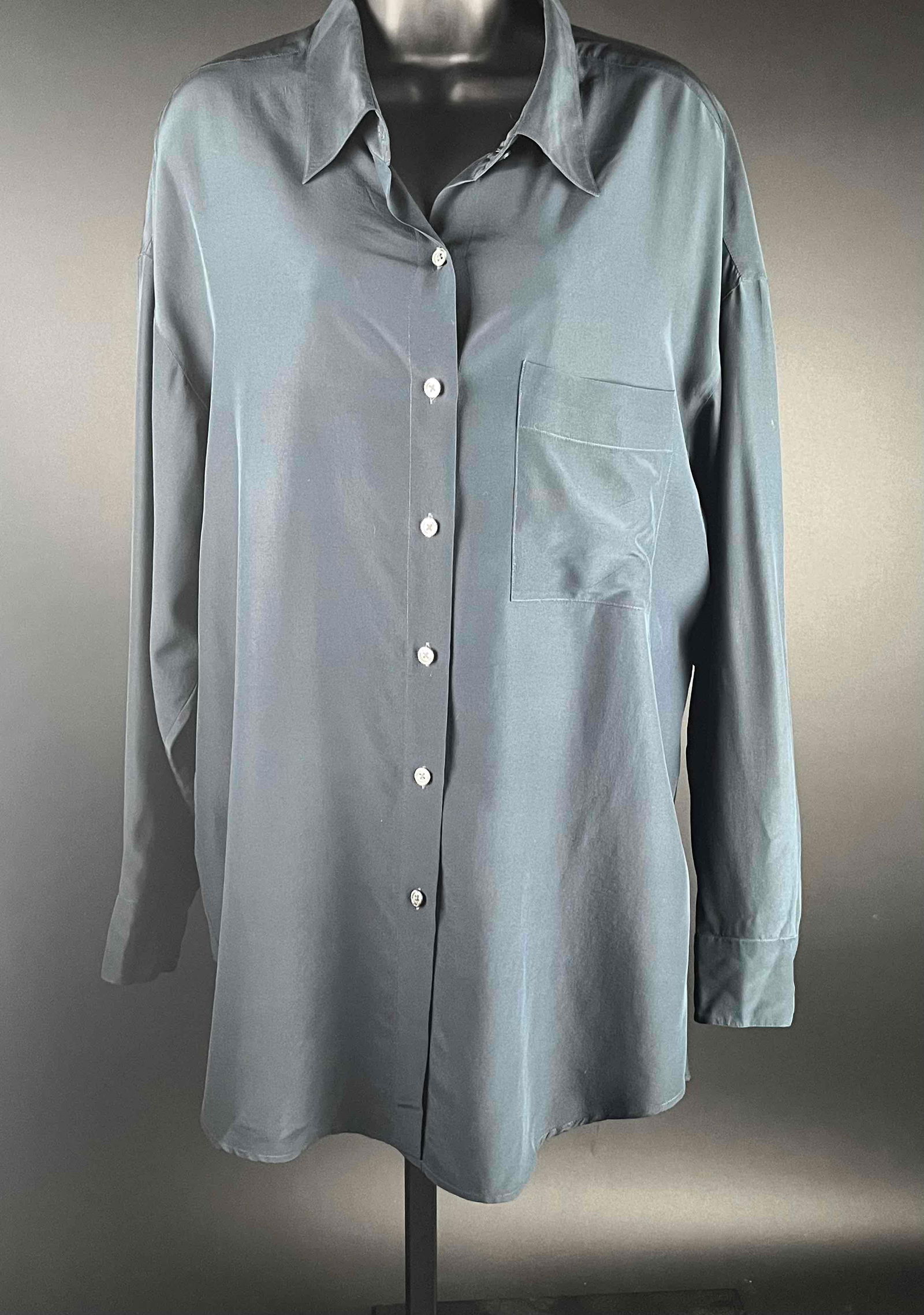 Women's DKNY Silk Button Up Shirt: 100% silk button up shirt by DKNY ( Donna Karan New York ) in black. Does have front pocket on the left side. Made in Hong Kong. In excellent vintage condition. Please see photos for additional detail