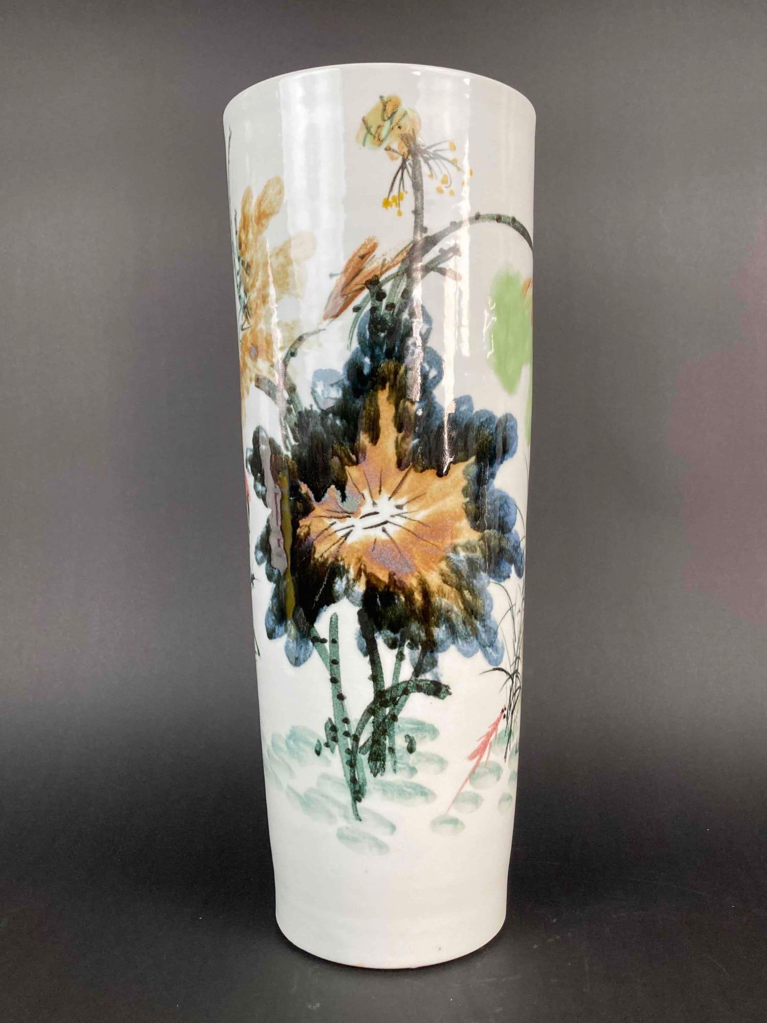Tall Hand Painting Asian Vase (Wheel Thrown): Tall Hand Painting Asian Vase (Wheel Thrown) Botanical Motif with an Asian theme. Piece is stamped. Vase measures 18" tall and is in good condition. Please see photos for additional details. | Ple