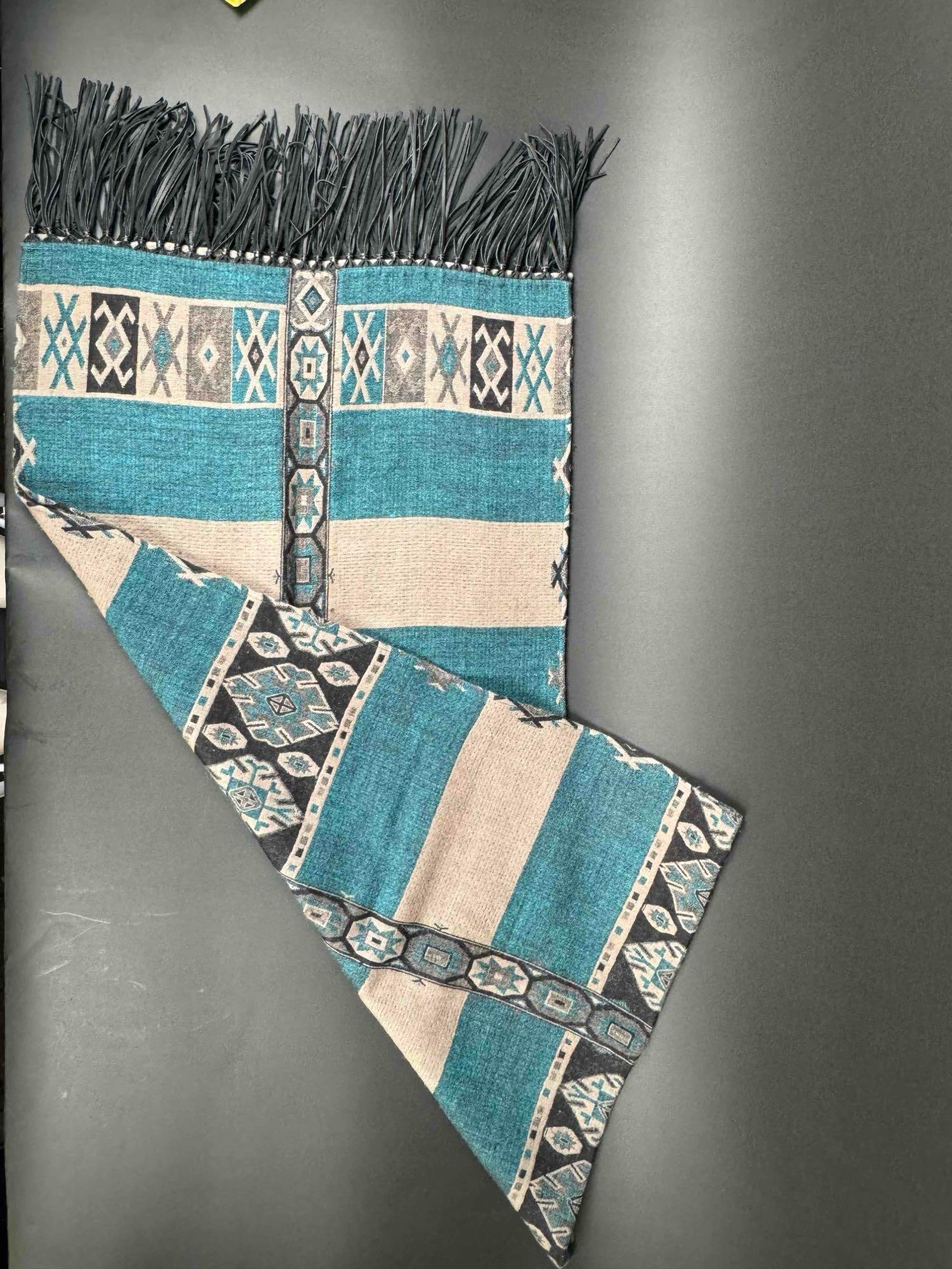 Aztec Print Scarf: Aztec print 100% merino wool scarf with leather tassels. Brand on scarf is " Bajra ". Made in Nepal. In great used condition. Please see photos for additional details. | Please note all lots s