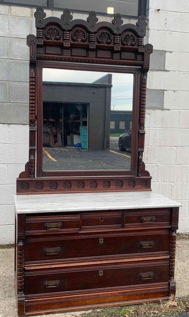 Antique Victorian Marble Top Mirrored Dresser (Wooten, 1860): Antique Victorian Marble Top Mirrored Dresser (Wooten, 1860) Carved details with key holes and dovetail drawers. Marble is in excellent condition. Piece is in good antique condition with minimal signs