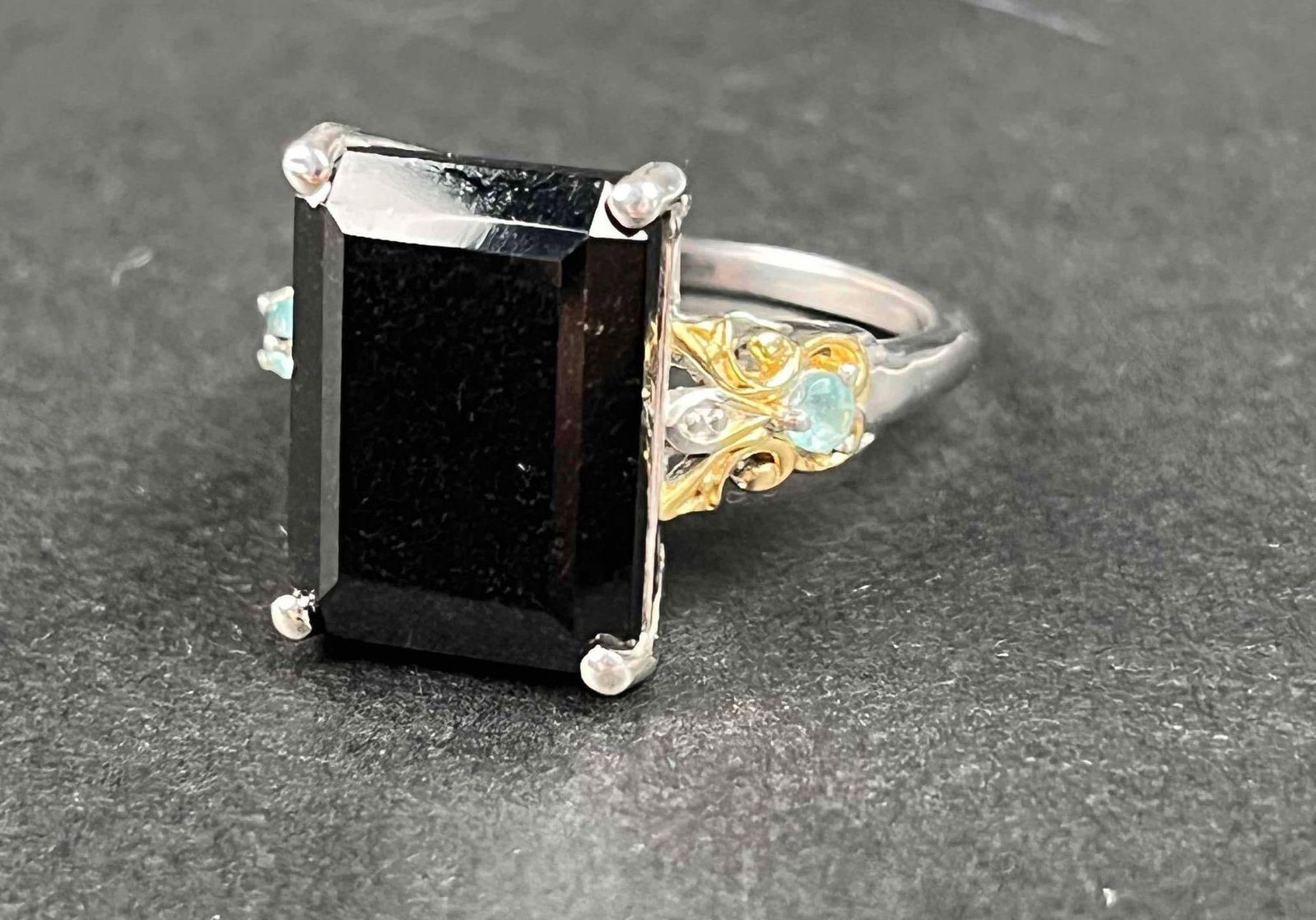 Australian Black Tourmaline Sterling Silver Ring: Australian black tourmaline sterling silver ring. Ring is size 10 and is 13.60 CTW. Ring is in excellent condition. Please refer to photos for further details. Please note all lots show signs of wear 