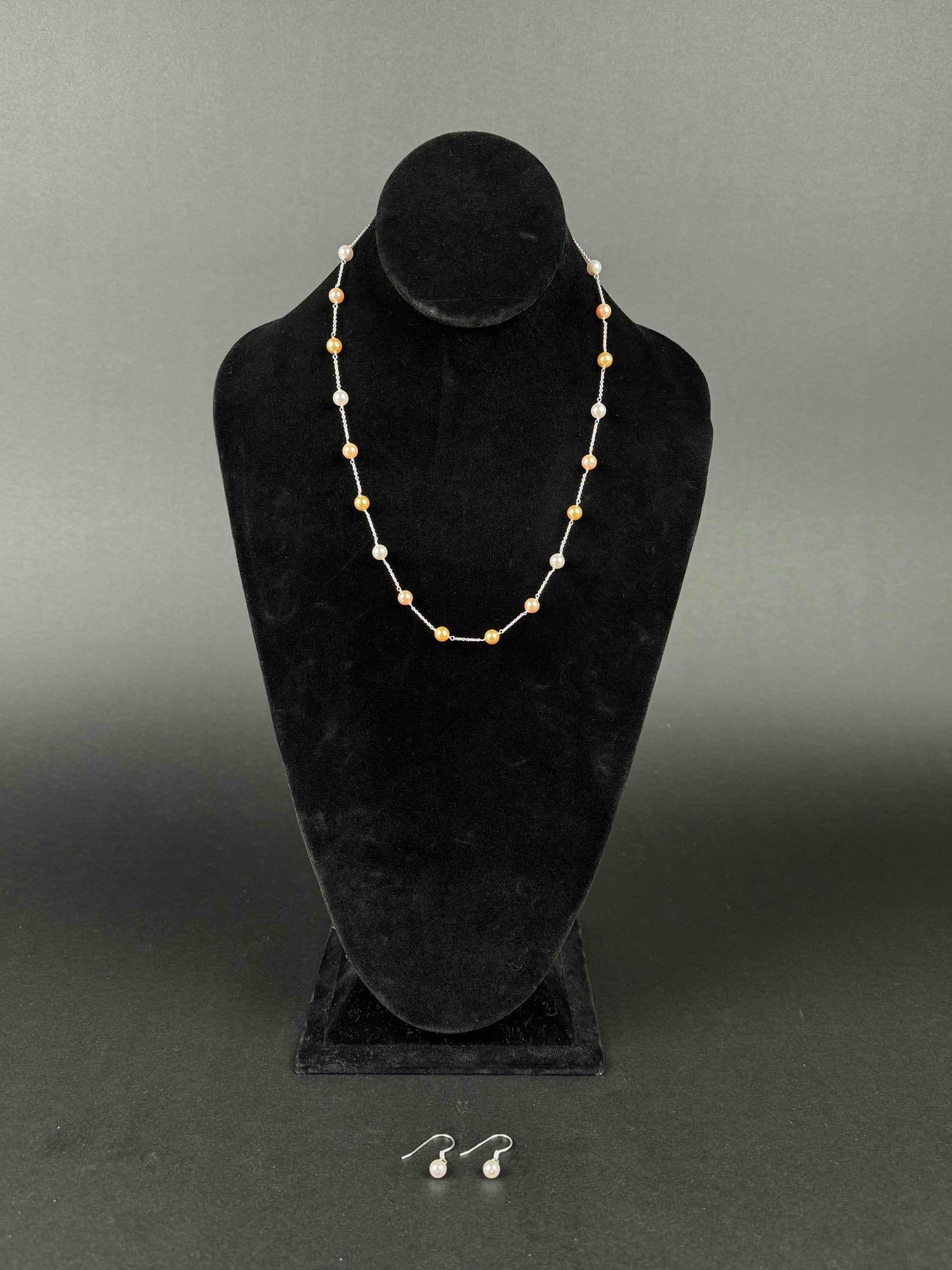 Multi-Colored Pearl Sterling Silver Necklace and Earrings: Multi colored pearl sterling silver necklace and earrings. Necklace comes in at a weight of 7.76 grams and the earrings weigh 1.20 grams. Necklace is stamped 925. Both items are in excellent condition
