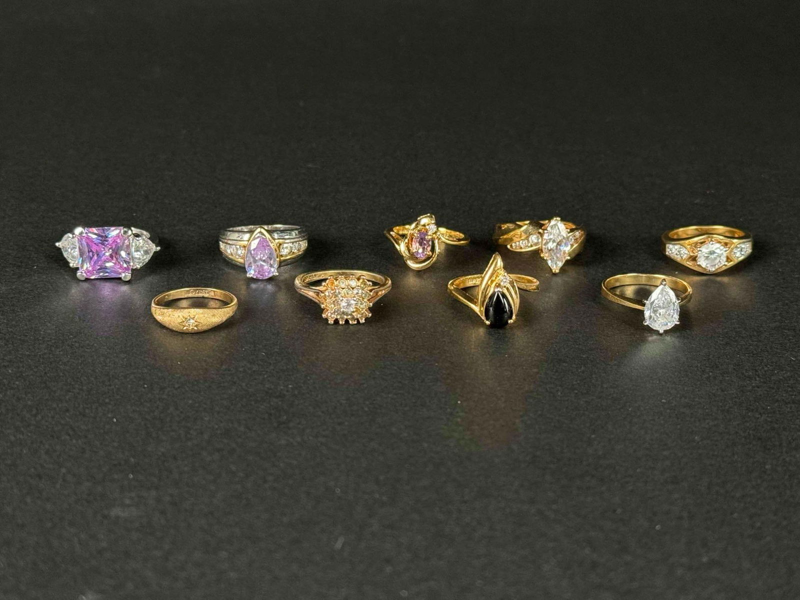 Lot of 9 Vintage Rings: Vintage rings, most made from Thailand and Taiwan. One vintage ring marked "Avon". One ring marked " 18K HGE" ( heavy gold electroplate ). All in great used condition. Please see photo