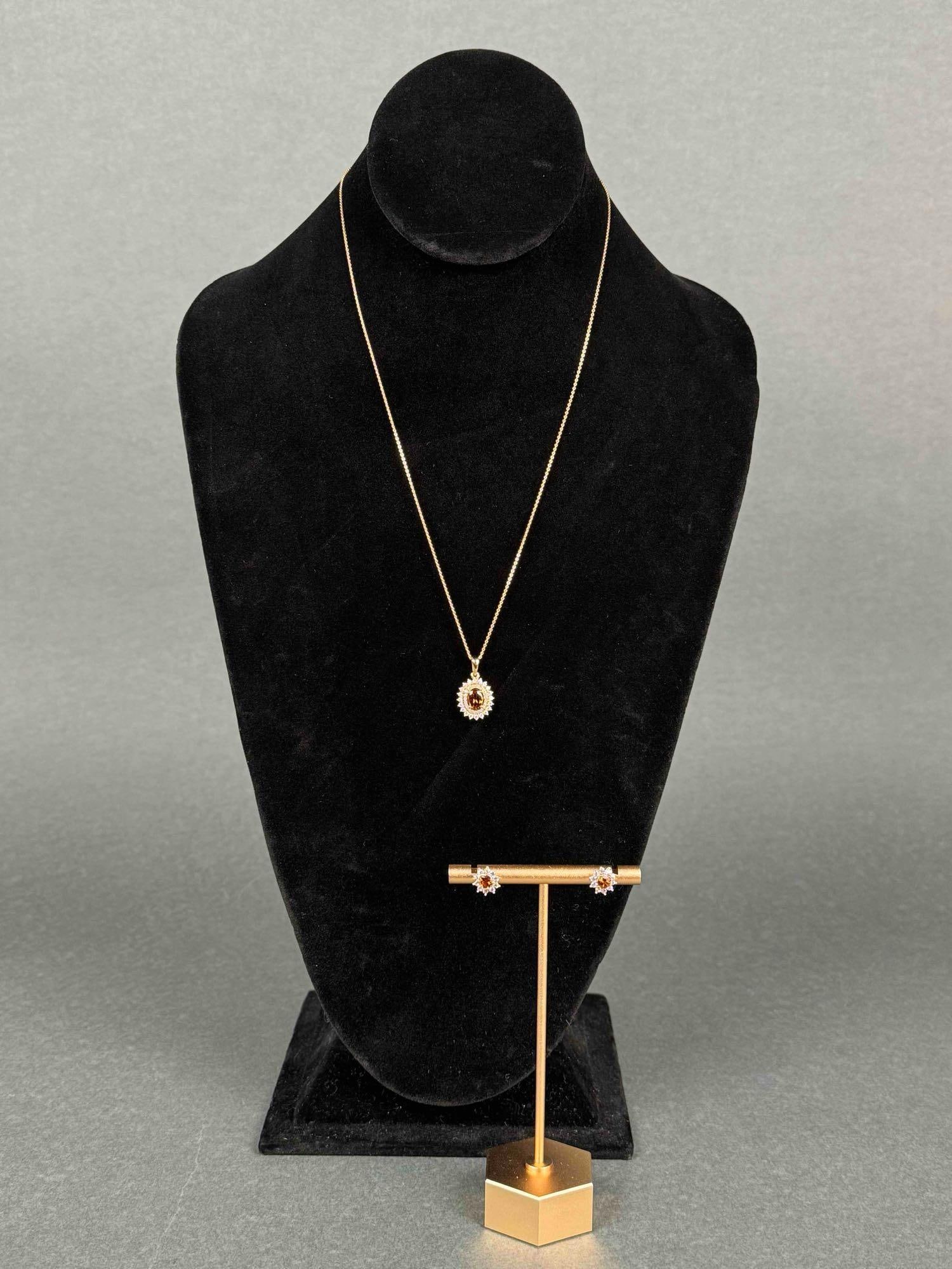 Golden Tourmaline and White Zircon Necklace and Earrings: Golden tourmaline sterling silver necklace and earrings. (4k over Sterling) Both are marked with "925 ". Earrings come in at a weight of 1.70 grams and necklace comes in at a weight of 3.90 gr