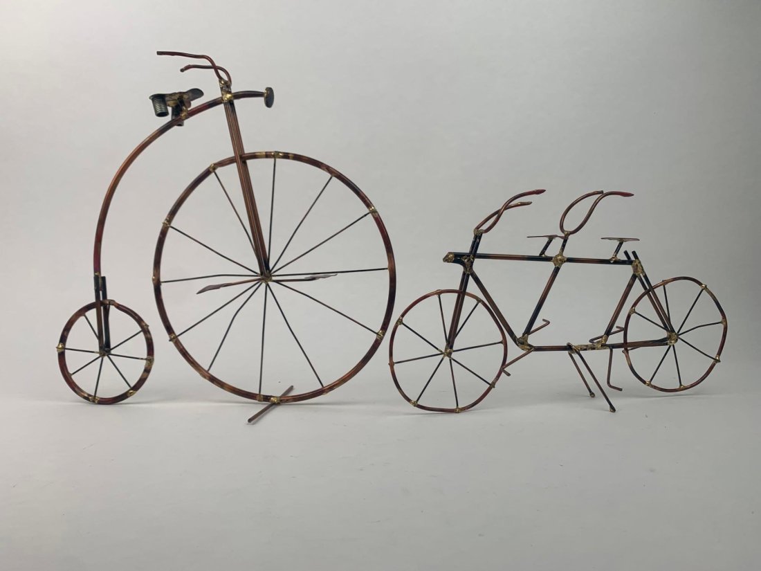 Pair of Welded Copper and Brass Cycle Sculptures: Pair of Welded Copper and Brass Cycles. (Tandem and High Wheeler) Sculptures are in excellent condition with no signs of visible wear. Please see photos for additional details. Dimensions Include : La