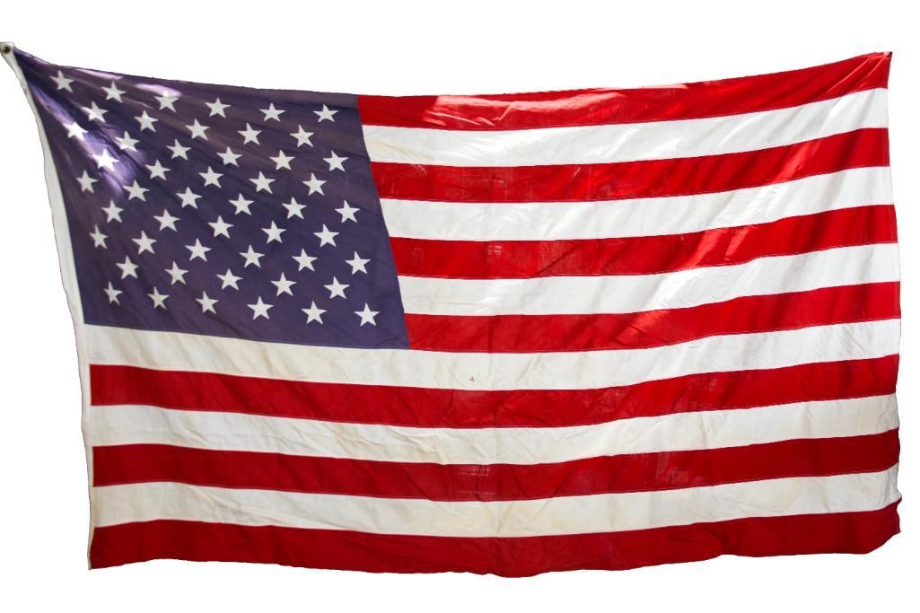 American Flag "Defiance" (CIRCA 1960): American Flag Circa 1960. Signs of wear are commensurate with age and use. Please see photos for additional details. Dimensions: 7' 8" x 4' 11" Weight: 2 lbs Please note all lots show 