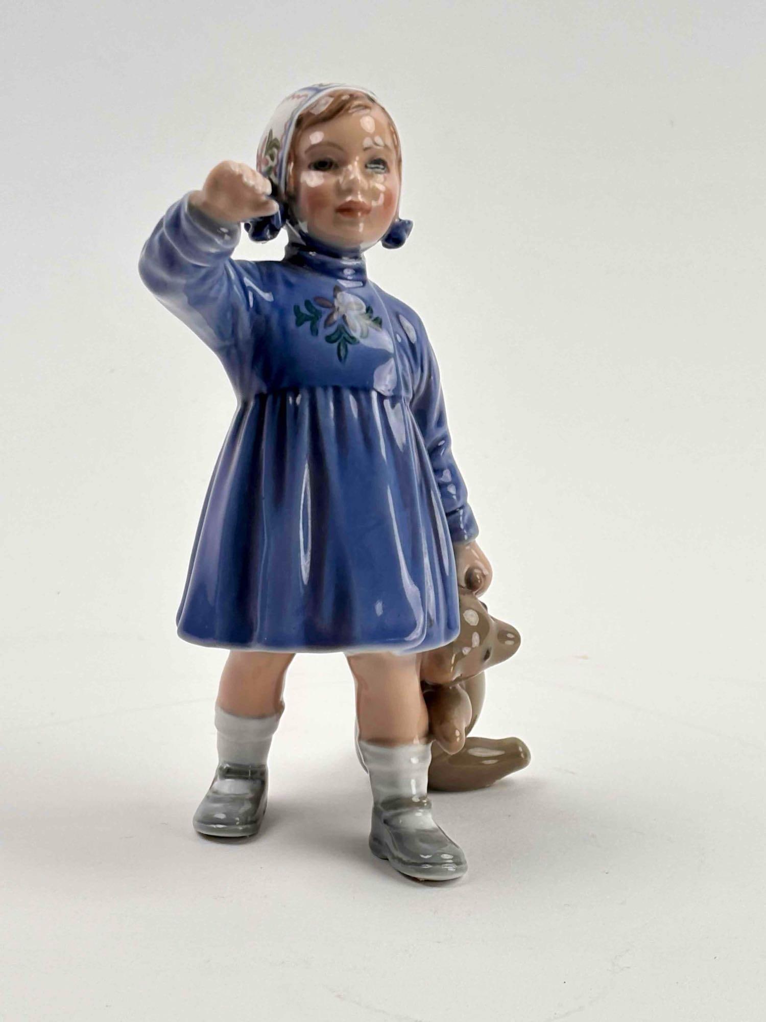 Dahl Jensen Porcelain Figurine, Girl with Teddy Bear: Glossy finish depicting a little girl with her teddy bear. DJ back stamp. Marked 1152. Excellent condition. Please see photos for additional details. Dimensions: 2.5" x 3.5" x 6" Weight: