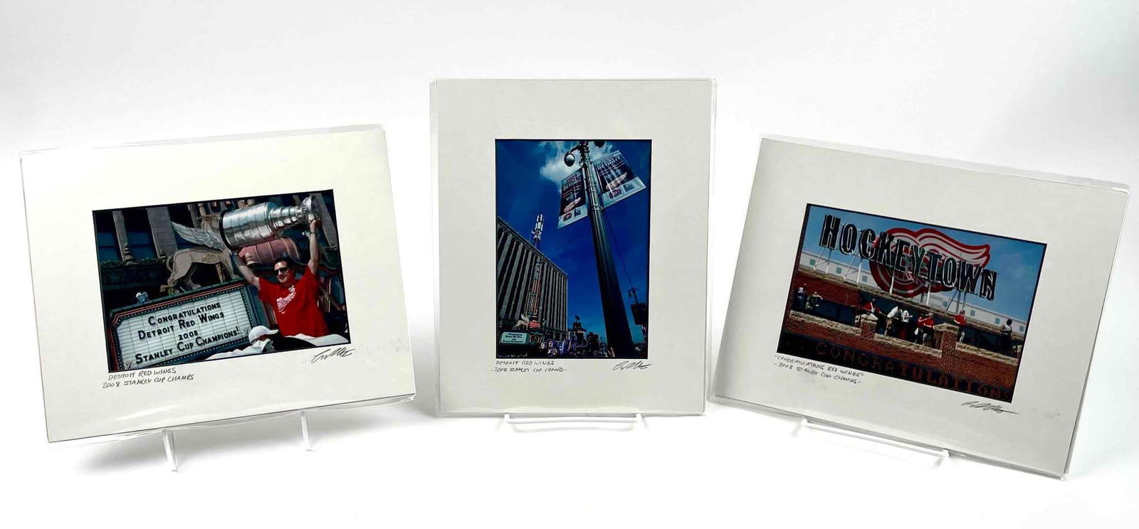 3 Detroit Red Wings Photographs (2008 Stanley Cup Champs): Three original photographs from the 2008 Stanley Cup Championship Parade in Detroit. Red Wings photos are signed in pencil in the bottom right corner. Excellent condition. Please see photographs for a