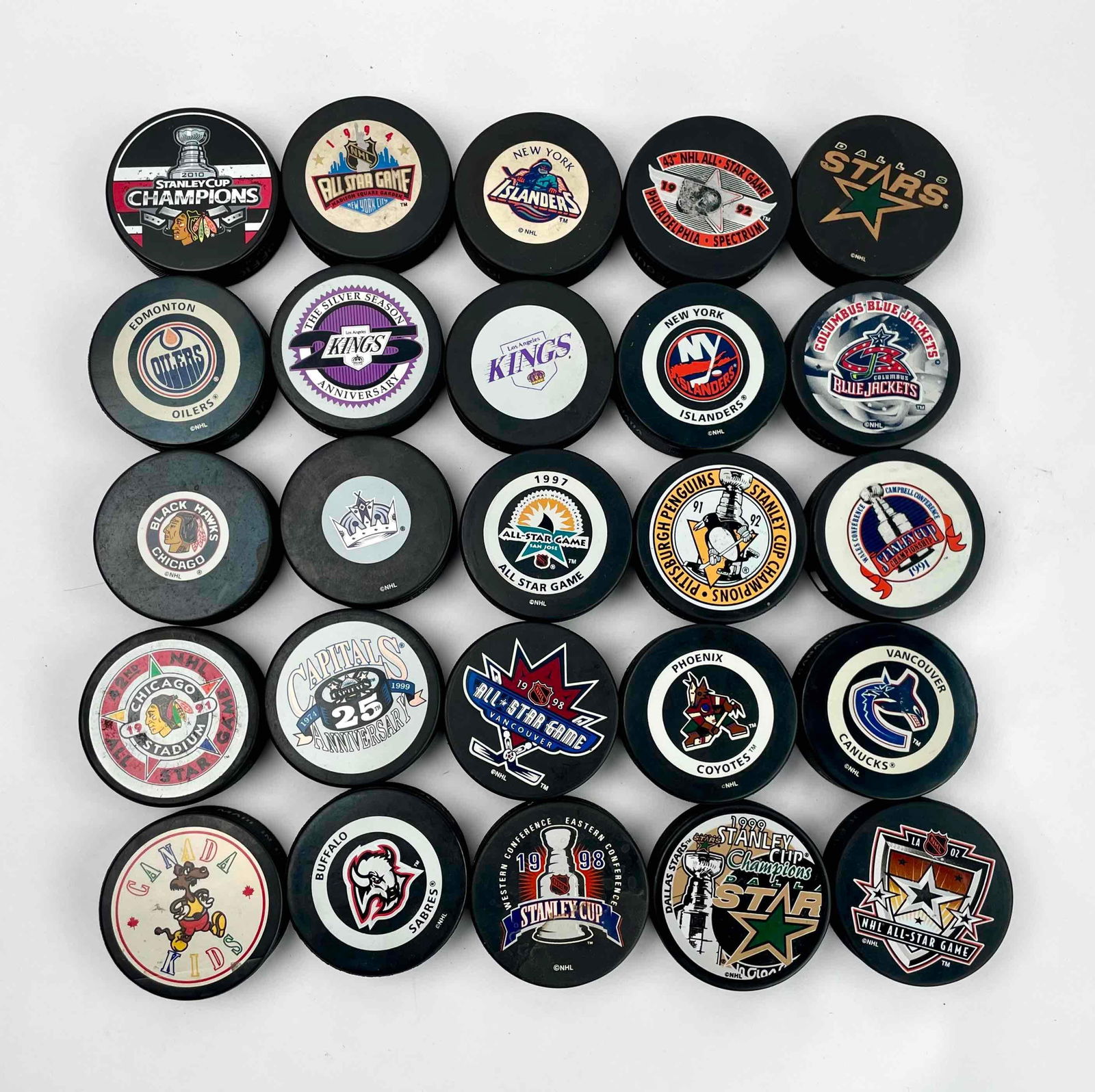 Large Collection of NHL Hockey Pucks (1 of 4)