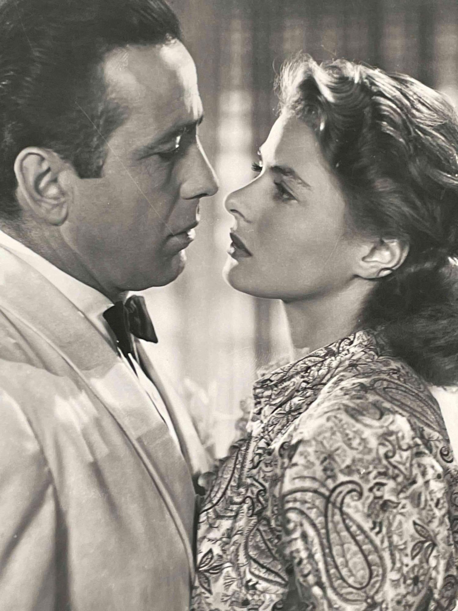 Casablanca Film Still (Ingrid Bergman Humphrey Bogart, 1942): Movie Still of "Casablanca" starring Humphrey Bogart and Ingrid Bergman. 1960s reprint from the 1942 film. In good vintage condition with signs of wear that are consistent with age, such as scratch in