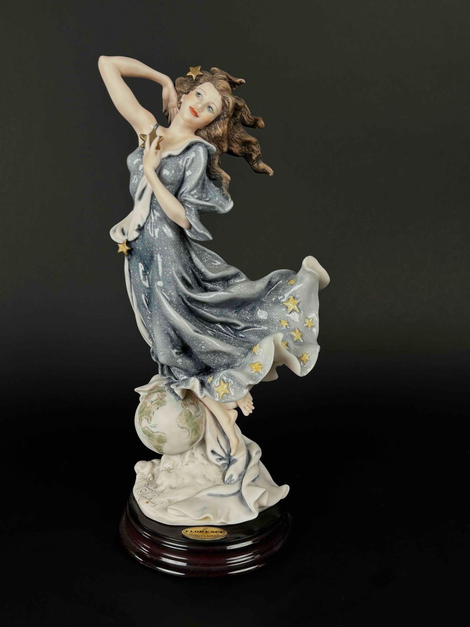 Giuseppe Armani "Celeste" Figurine of the Year 2000 (1302C): Giuseppe Armani Celeste 1302C Figurine. Figurine of the Year 2000. Signature engraved on the base. In excellent condition. Comes with the original box. Please see photos for additional details. Dimens