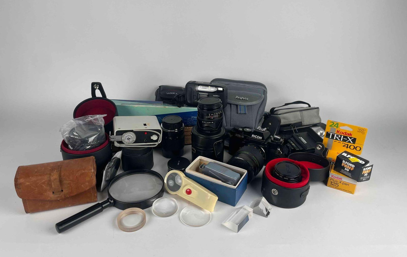 Large Lot of Assorted Optics (Cameras, Lenses, Riffle Scopes, and More) (1 of 12)