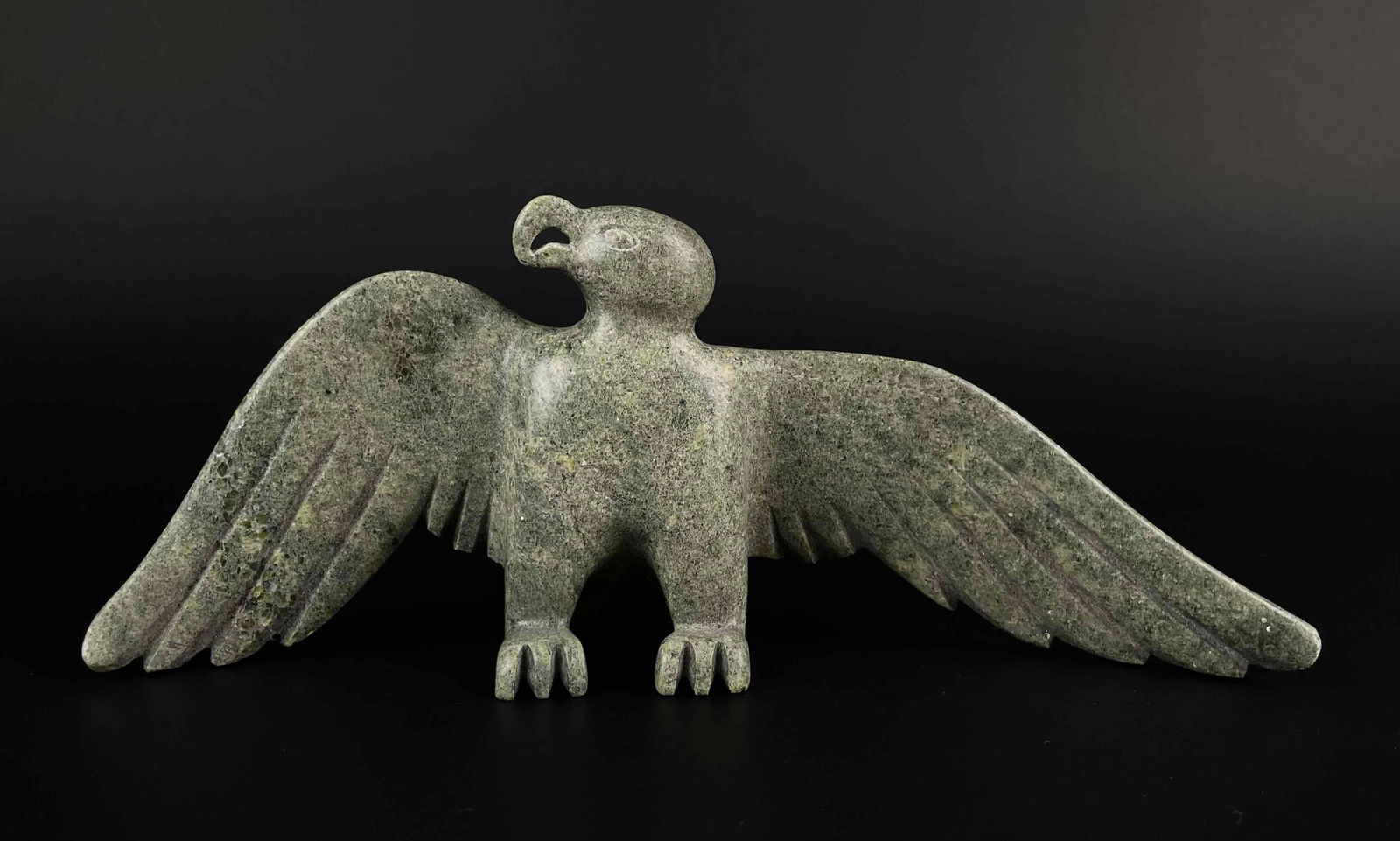 Inuit Green Soapstone Bird Sculpture (Cape Dorset/Kinngait, 1970s): Inuit soapstone sculpture of a bird with wings outstretched. No signature. Artist unknown. Purchased directly from the artist on Cape Dorset/Kinngait, in the 1970s. From the private collection of a pr