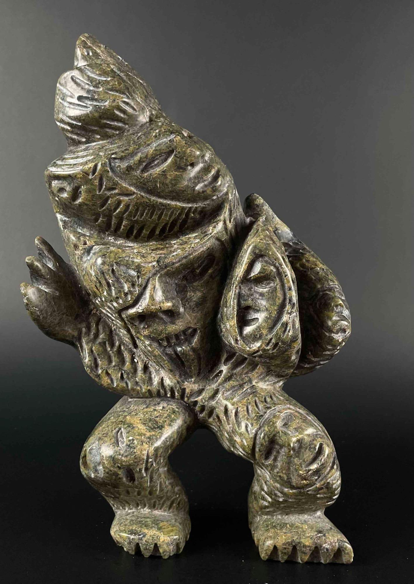 Inuit Abstract Spirit Carving (Tytoosie Tunnillie, Cape Dorset/Kinngait): Inuit abstract spirit carving. Polished soapstone. Piece is signed in Inuktitut syllabics on the foot by Tytoosie Tunnille. This piece was purchased directly from the artist in Cape Dorset/Kinngait by