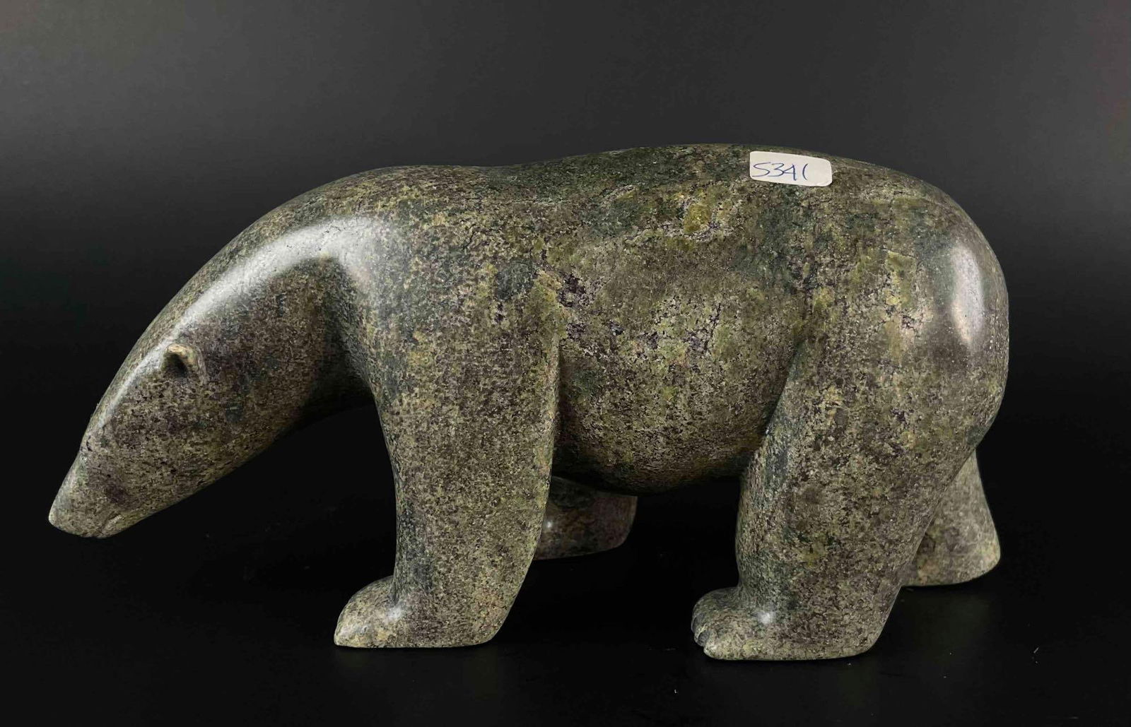 Inuit Walking Bear Carving (Capr Dorset/Kinngait): Inuit walking bear sculpture with. Polished green soapstone. Piece is unsigned. This piece was purchased directly from the artist in Cape Dorset/Kinngait by collector Jon Jacobs, a prominent collector