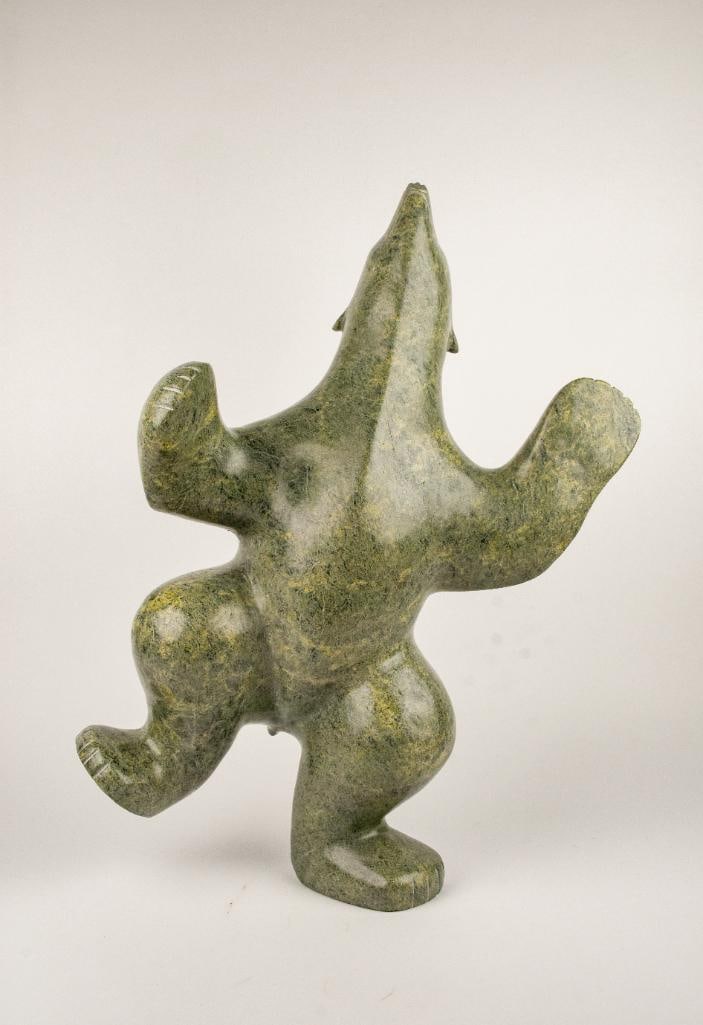 Extra Large Inuit Dancing Bear (Tuck Nuna, Cape Dorset/Kinngait): Inuit soapstone sculpture of a dancing bear. Polished green stone. Piece is signed "Tuck Nuna" on the foot. This piece was purchased directly from the artist in Cape Dorset/Kinngait by collect
