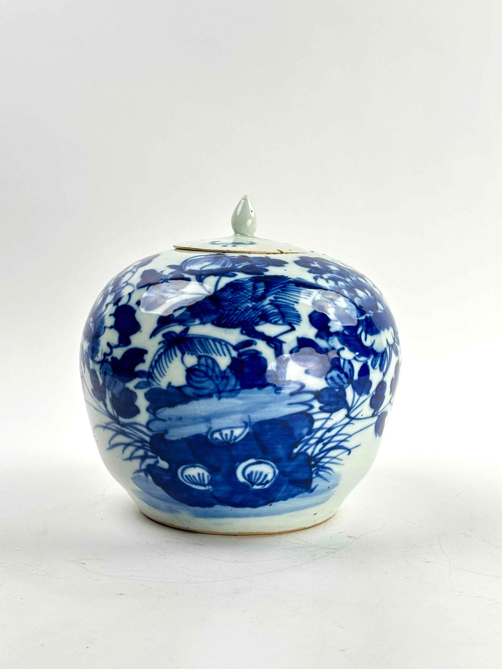 Large Antique Blue and Celadon Ginger Jar (China): Large ceramic ginger jar with fitted lid. Jar is porcelain and glazed blue with celadon. Bird and floral motif. Good condition with a chip on the lid as pictured. Please see photos for additional deta