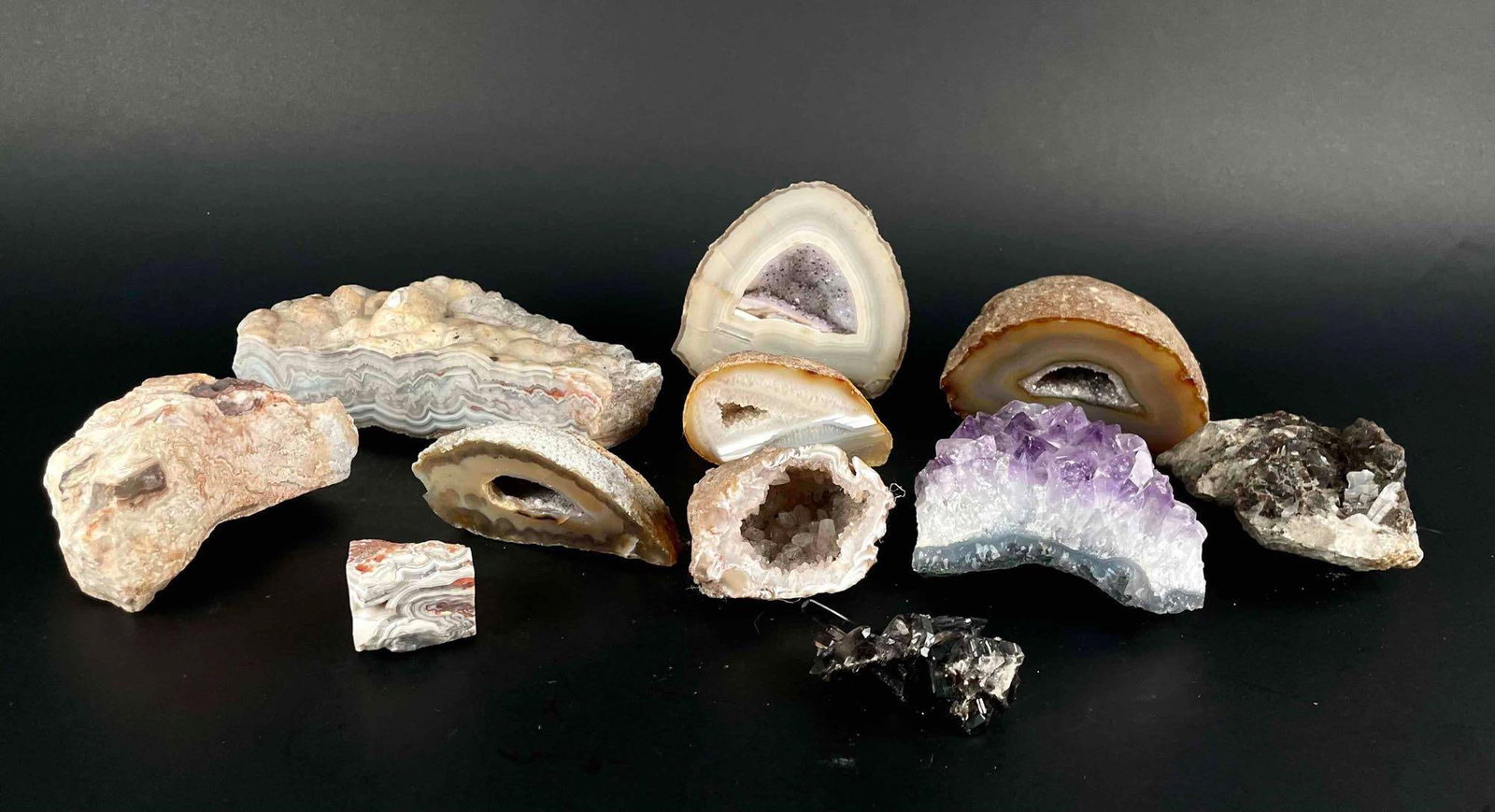 Collection of Geodes (Amethyst, Fluorite, Smoky Quartz , Crazy Lace Agate): Assortment including 5 Geodes, 1 Amethyst, 1 Fluorite, and 1 Smoky Quartz, and 3 Crazy Lace Agates. From the home of John Jacobs, a prominent collector in Michigan. All rocks are in good condition, so