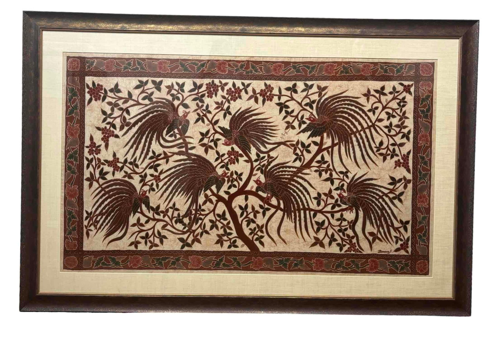 Framed Batik Scarf (Surabaya, Java): Framed Indonesian batik scarf depicting branches and birds in earth tones. Excellent condition. Please see photos for additional details. Dimensions Frame: 71" x 2" x 47" Dimensions Work: 