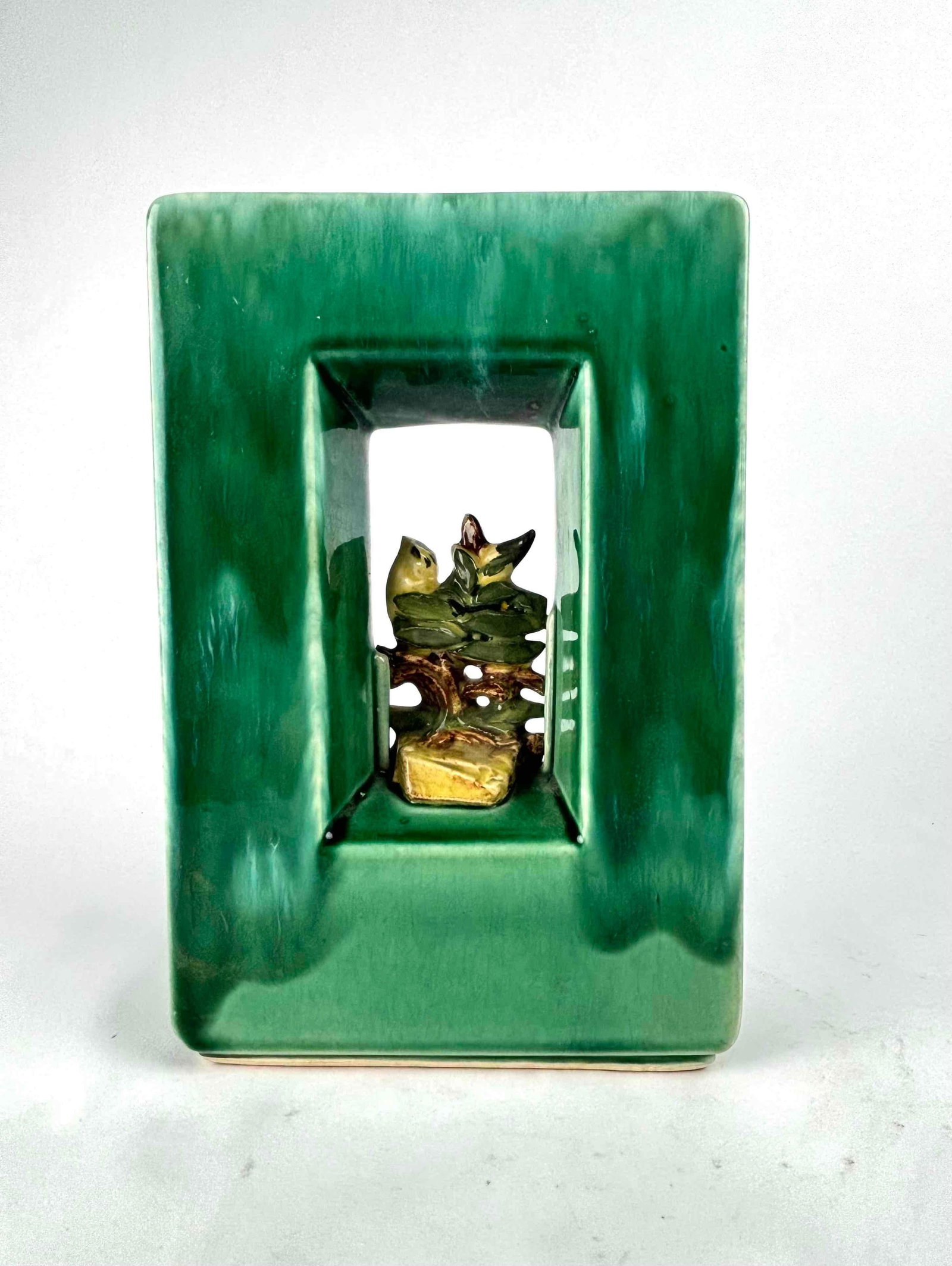 Canary Cermaic Vase (McCOY): Green ceramic vase with canary by Mccoy. "Mccoy USA" hallmark is located on bottom of vase. In excellent condition. From the home of John Jacobs, a prominent collector in Michigan. Please see 