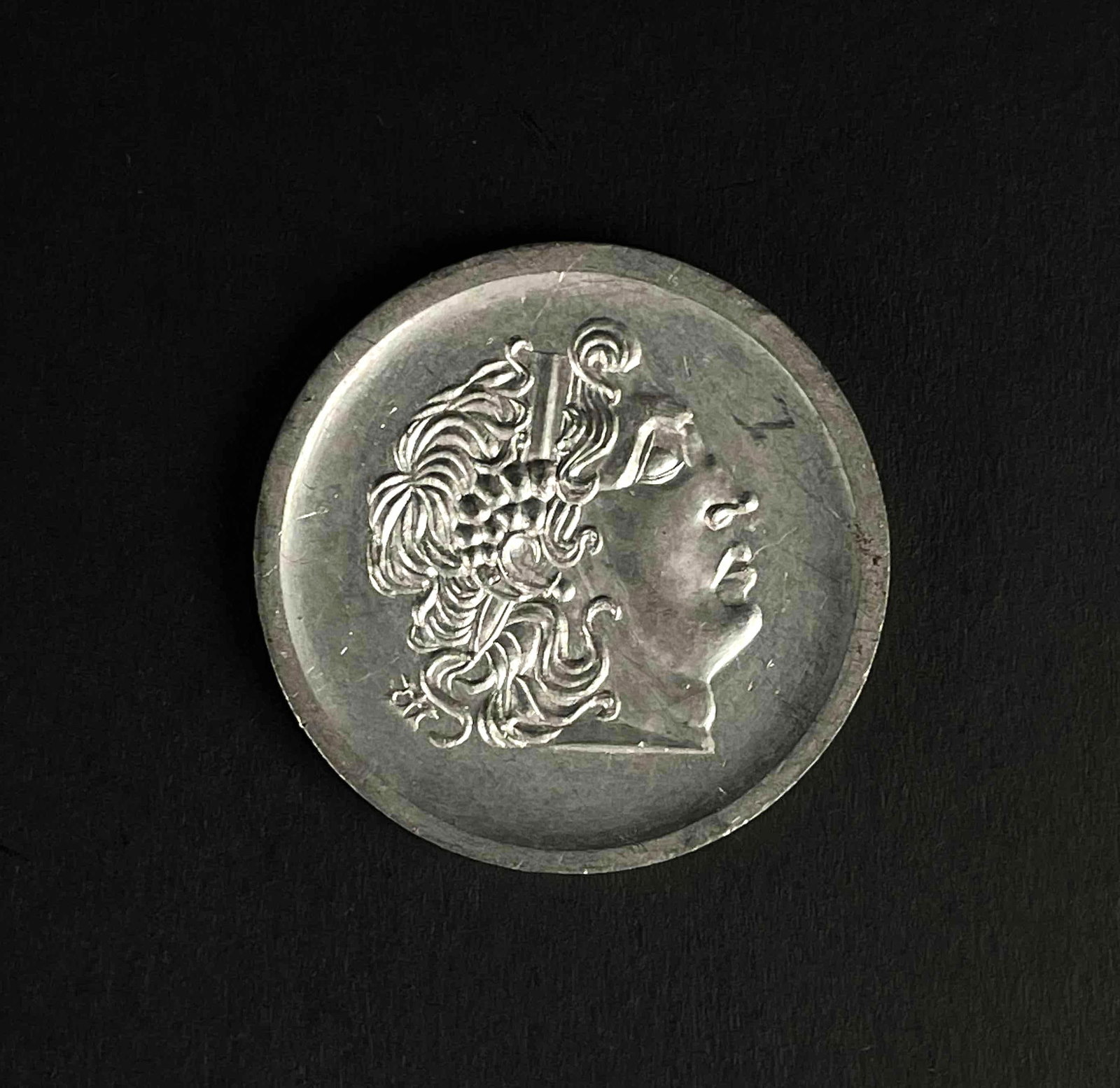 Roman Tetrodrachma Coin (Alexander the Great): Roman Tetrodrachma coin. Portrait depicts Alexander the Great. From the home of Jon Jacobs, a prominent collector in Michigan. Please see photos for additional details. Dimensions: 1.5" x 1.5" x 0.25"