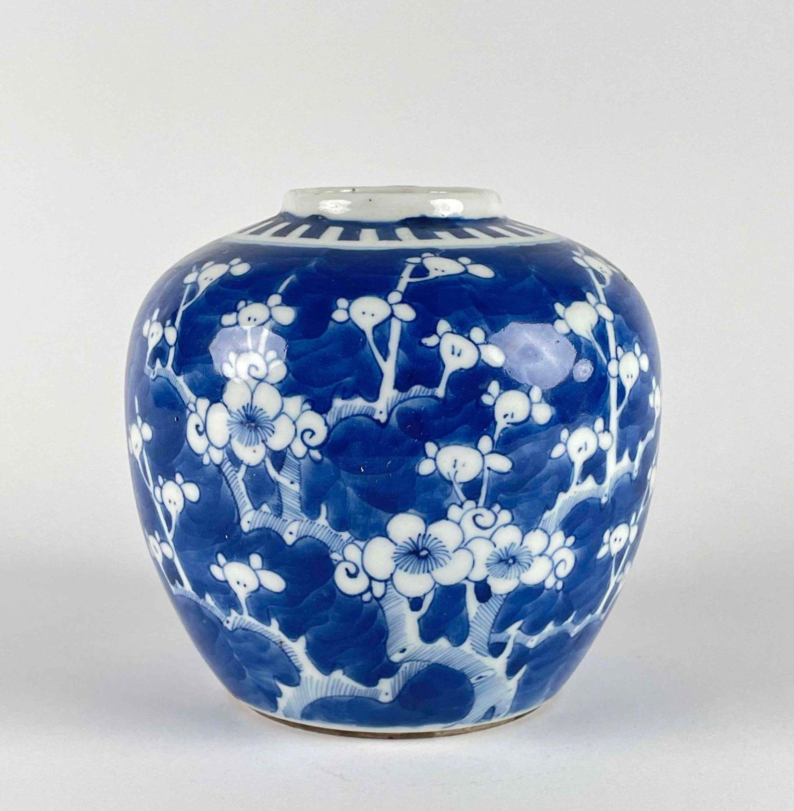 Antique Chinese Blue and White Porcelain Ginger Jar: Chinese blue and white porcelain ginger jar with Hawthorne tree motif. From the home of Jon Jacobs, a prominent collector in Michigan. Jar shows surface crazing. There is sticker residue left on side.