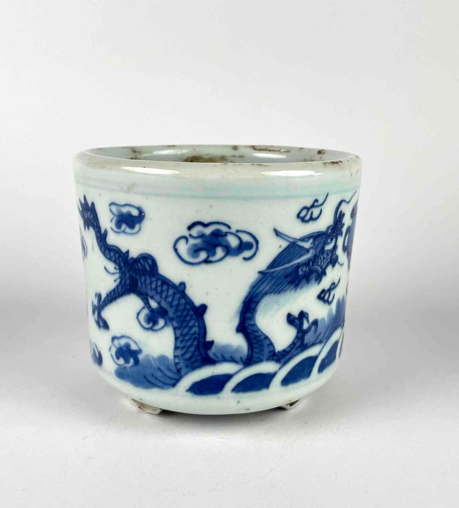 Antique Chinese Blue and White Porcelain Censer: Antique Chinese blue and white porcelain censer used for burning incense. Motif depicts twin dragons among clouds. From the home of Jon Jacobs, a prominent collector from Michigan. Censer is in good a