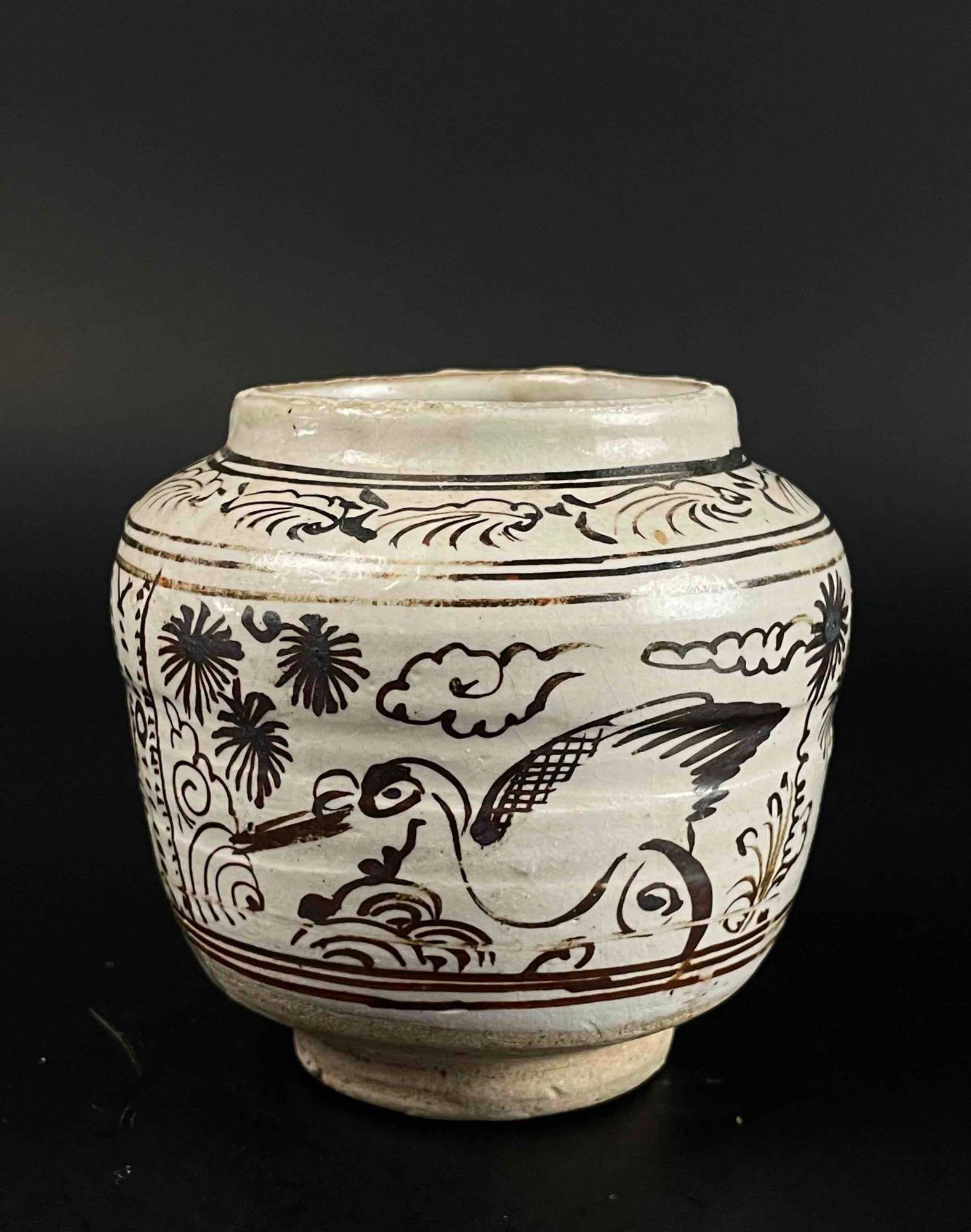 Chinese Ming Cizhou Earthenware Pottery: Chinese Ming Cizhou earthenware pottery. Motif depicts two birds among plants. Sticker on bottom of vase is labeled "70." From the home of Jon Jacobs, a prominent collector in Michigan. Vase is in goo