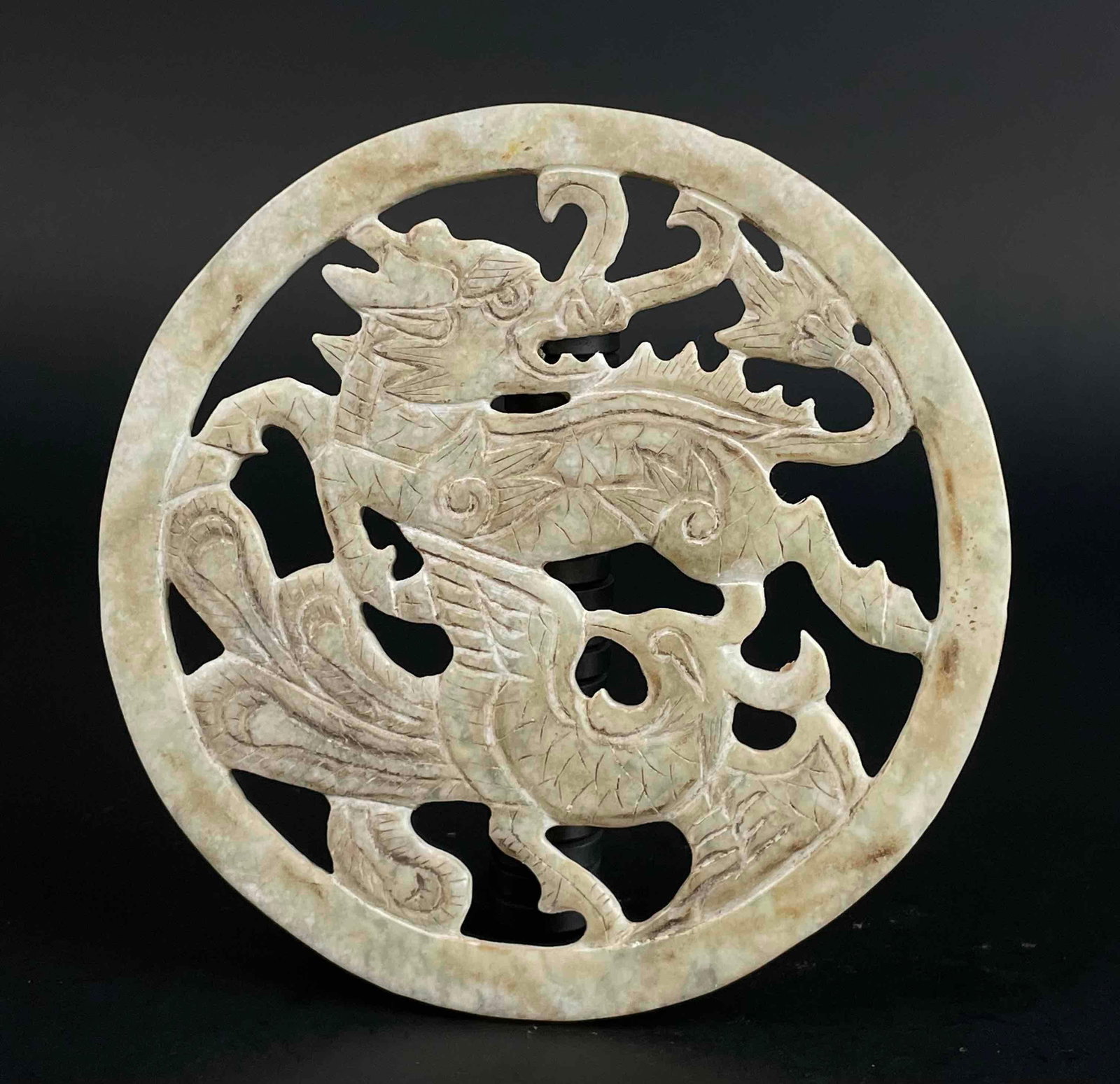Chinese Carved Natural Jade Medallion: Chinese carved natural jade medallion. Medallion depicts a hooved animal and a bird figure. From the home of Jon Jacobs, a prominent collector in Michigan. Please see photos for additional details. Di
