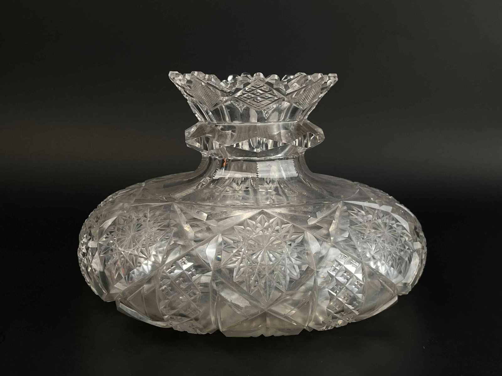 American Brilliant Cut Bulbous Vase: American brilliant cut vase with bulbous shape. Vase has the empress pattern and a flower shaped mouth. From the home of Jon Jacobs, a prominent collector in Michigan. Vase is in good condition with s