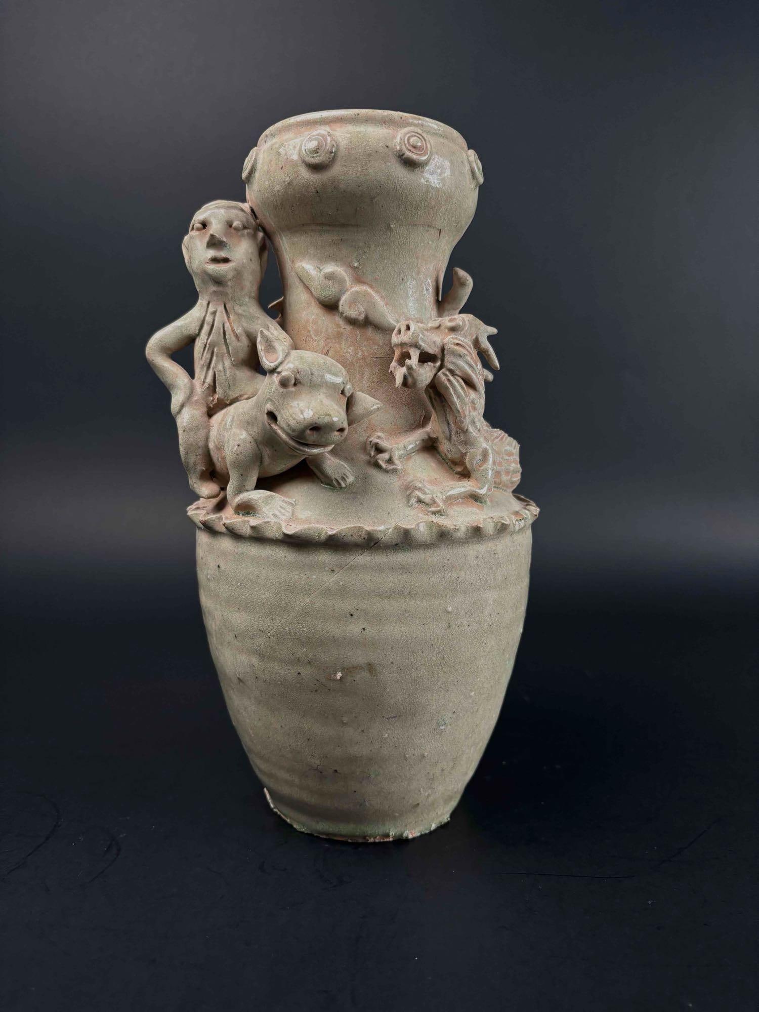 Antique Chinese Funerary Urn (Song/Sung): Antique Chinese funerary urn, Song Dynasty, celadon glazed terracotta, each with applied decoration in the form of attendants, dragons, clouds, and birds. From the home of Jon Jacobs, a prominent coll