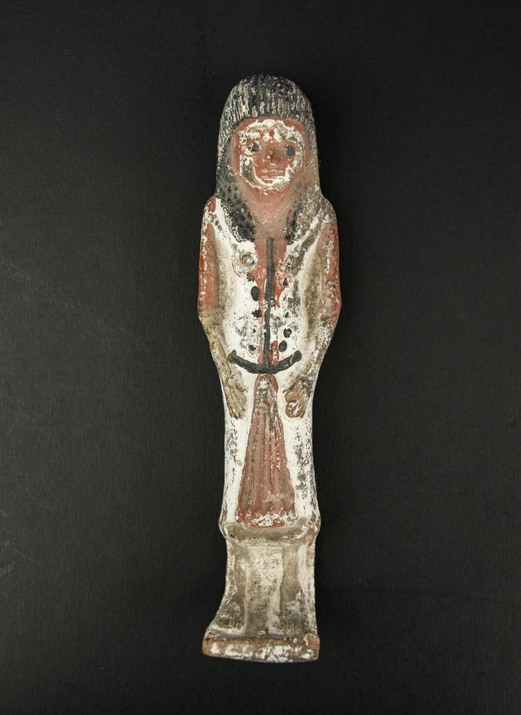 Pair of Ancient Egyptian Gesso Wood Ushabti: Ancient Standing mummiform, the figures present with a black wig and characteristically large eyes, as well as brown-painted hoes. From the home of collector Jon Jacbobs. Please see photos for additio