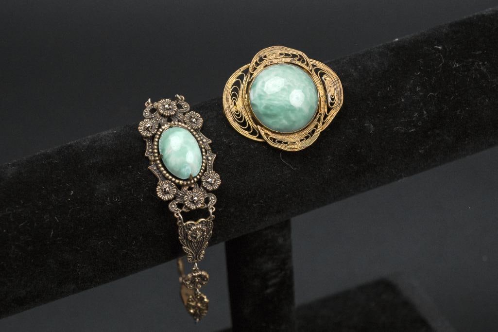 Two Pieces of Czech Peking Glass Jewelry (Art Deco): Pair of Czech Peking glass jewelry in an art deco design. Included is a brooch and bracelet. Both pieces are in good antique condition with moderate signes of wear and use consistent with age. Please 