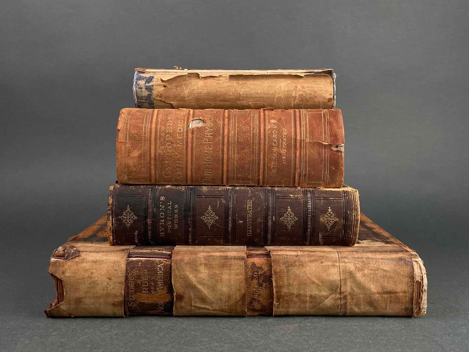 Four Antique Books (circa 1800s): Four antique books from the 1800s. Please see photos for additional details. Set includes: The Poetical Works of Lord Byron The Birds of North America Our Home Physician Th Joint Comitee Conduct of th