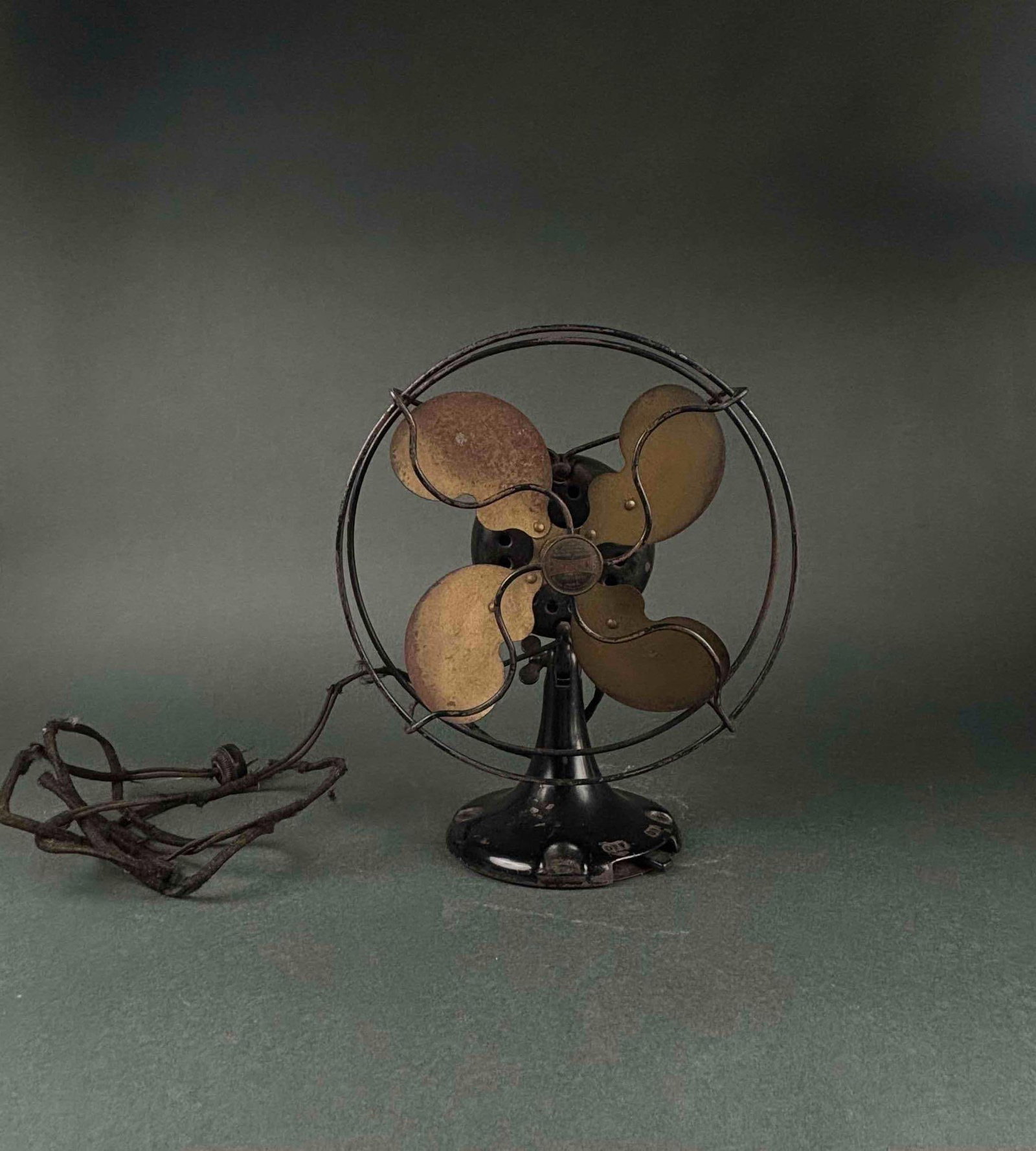 Emerson Jr. Industrial Blade Fan: Emmerson Jr 4 blade industrial fan. Vintage. Working at the time of posting. Wear that is commensurate with age and use. Cord is worn as pictured. Please see photos for additional details. Dimensions: