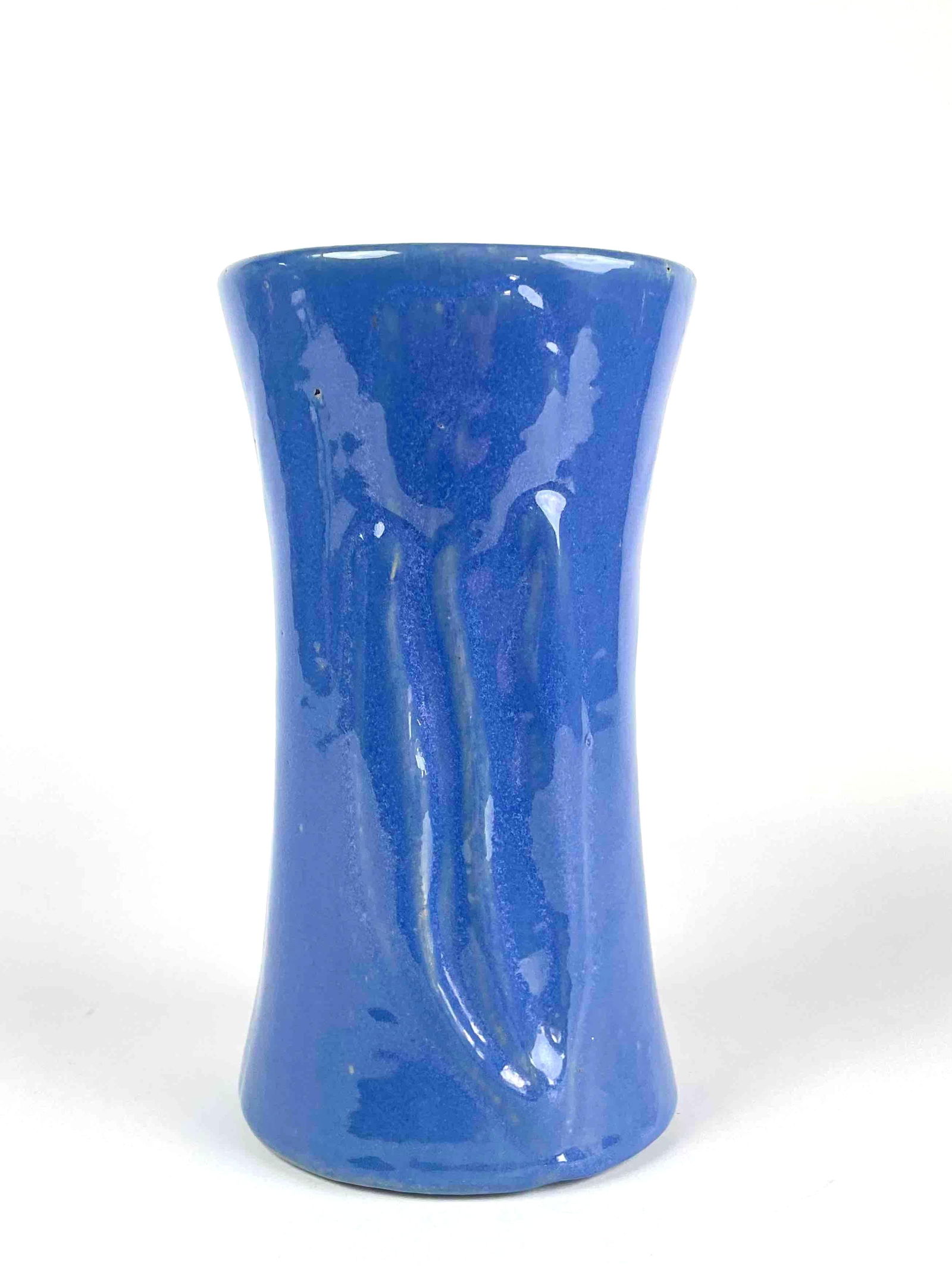 Zainesville Stoneware Pottery Vase #570: Zainesville Stoneware Pottery Vase. Glaze is a purple blue shade. Marked as 570 on base. In excellent condition. Please see photos for additional details. Dimensions: 4.75" x 4.75" x 8.5" Weight: 2.6