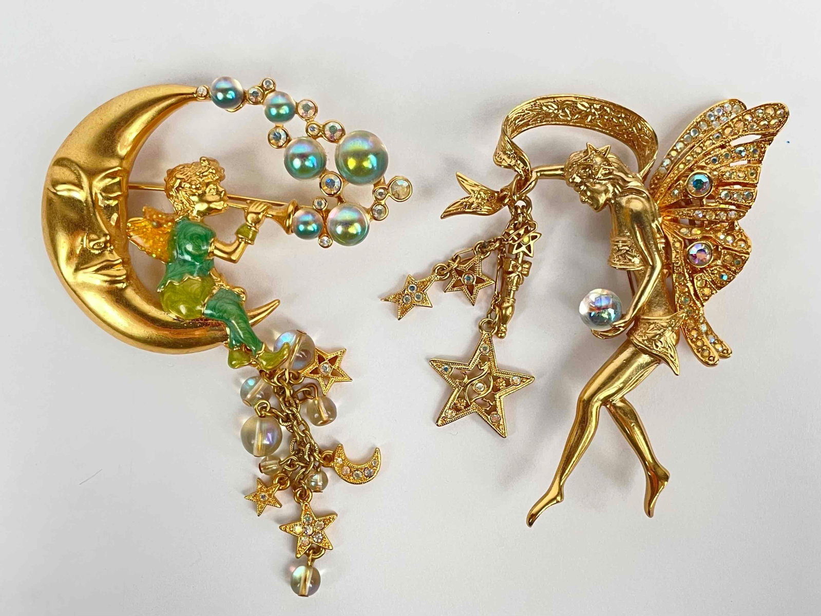 Kirks Folly Brooches (Fairy Godmother, Pipedream Fairy): Two brooches by Kirks Folly. Includes the Fairy Godmother pin, and the Pipedream Fairy pin. Both pins have gold toned hardware with rhinestone accents. Pipedream fairy also has enamel detail. Hallmark