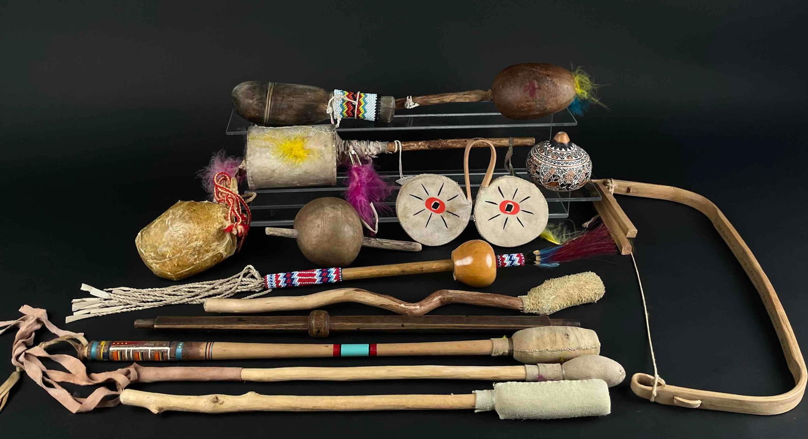 Group Of Native American Instruments (rattles, Drum Beaters, Bow) Auction