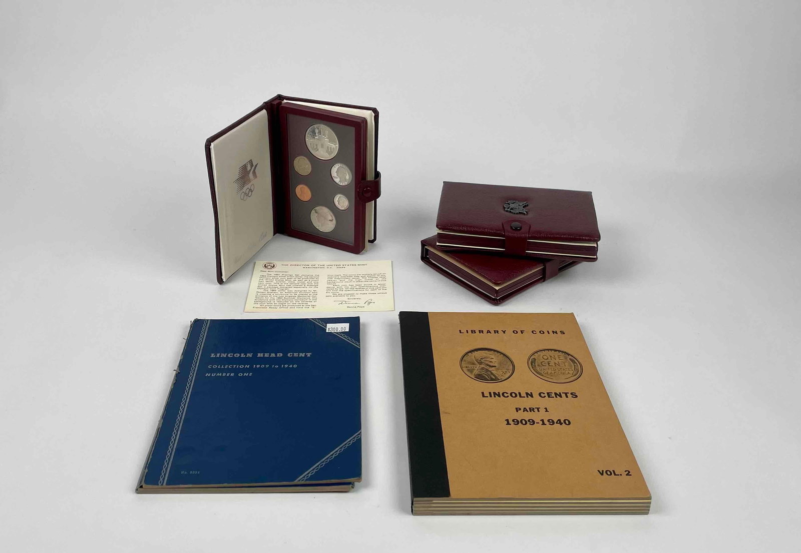 Three Olympic Coin Proof Sets (1983, 1984) and Two Lincoln Cent Collections (1909-1940) (1 of 12)
