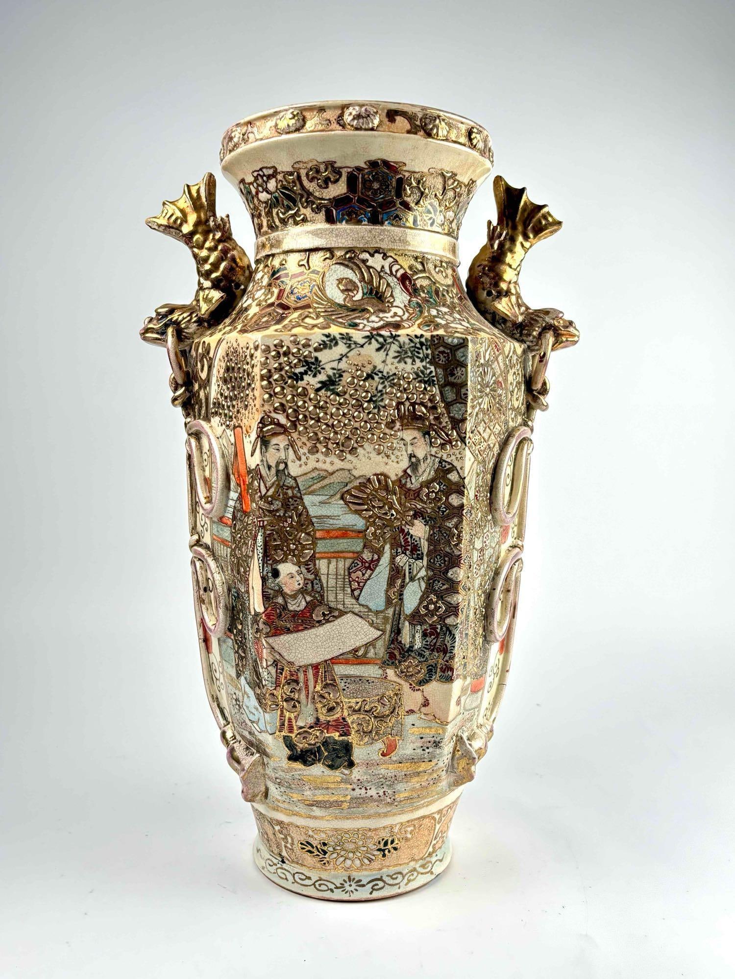Japanese Meiji Satsuma Vase: Japanese Meiji Satsuma Vase. Gilded over glaze with figural motif. Bowed, corded embellishments. Vase shows signs of wear consistent with age. No major chips, cracks, or scratches. Please see photos f