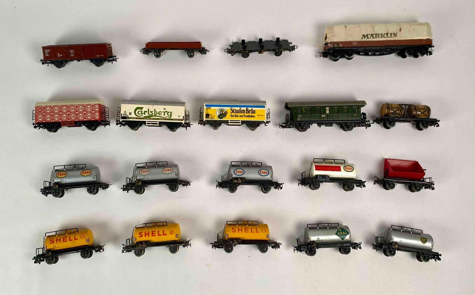Marklin Railway Cars: Lot of 19 Marklin Railway Cars. Lots are in good condition. Please note that this lot shows signs of wear consistent with age and use. Please see photos for additional details. Marklin Models: 393C -