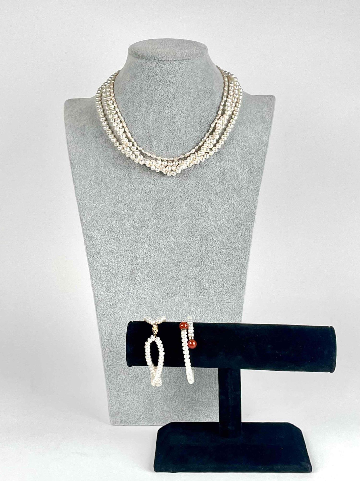 Assorted 14K Gold and Pearl Jewelry (Includes Carnelian): Assorted 14K yellow gold and pearl necklaces and bracelets. Includes: One single strand hand knotted pearl necklace with 14K yellow gold fish hook clasp. One single strand baroque pearl necklace with 