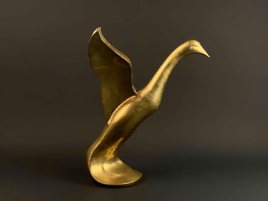 Brass Duck in Flight Sculpture