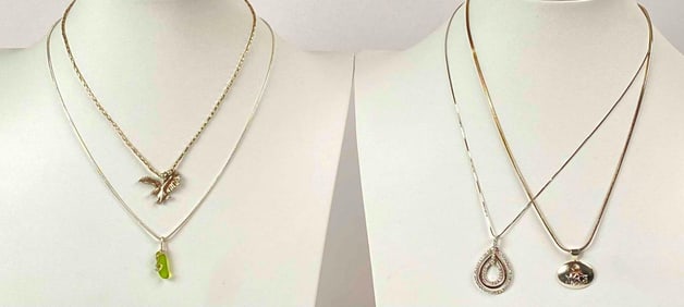 Four Sterling Silver Pendant Necklaces