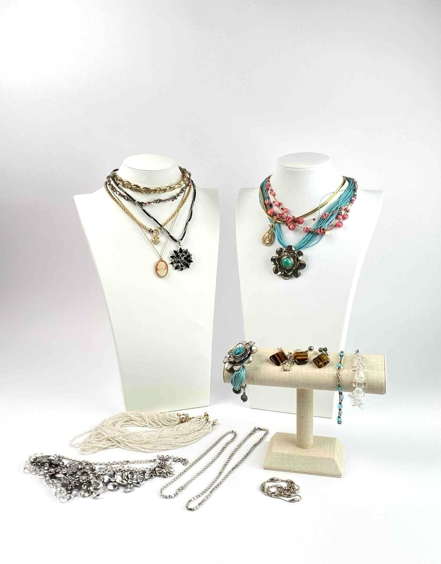 Group of Costume Jewelry (Sarah Coventry, Napier, Sorrelli, Kostibas, 1928): Group of costume jewelry consisting of necklaces, bracelets, and earrings. Includes a variety of necklace designs. Marked makers include Sarah Coventry, Napier, Sorrelli, Kostibas, and 1928. Items are
