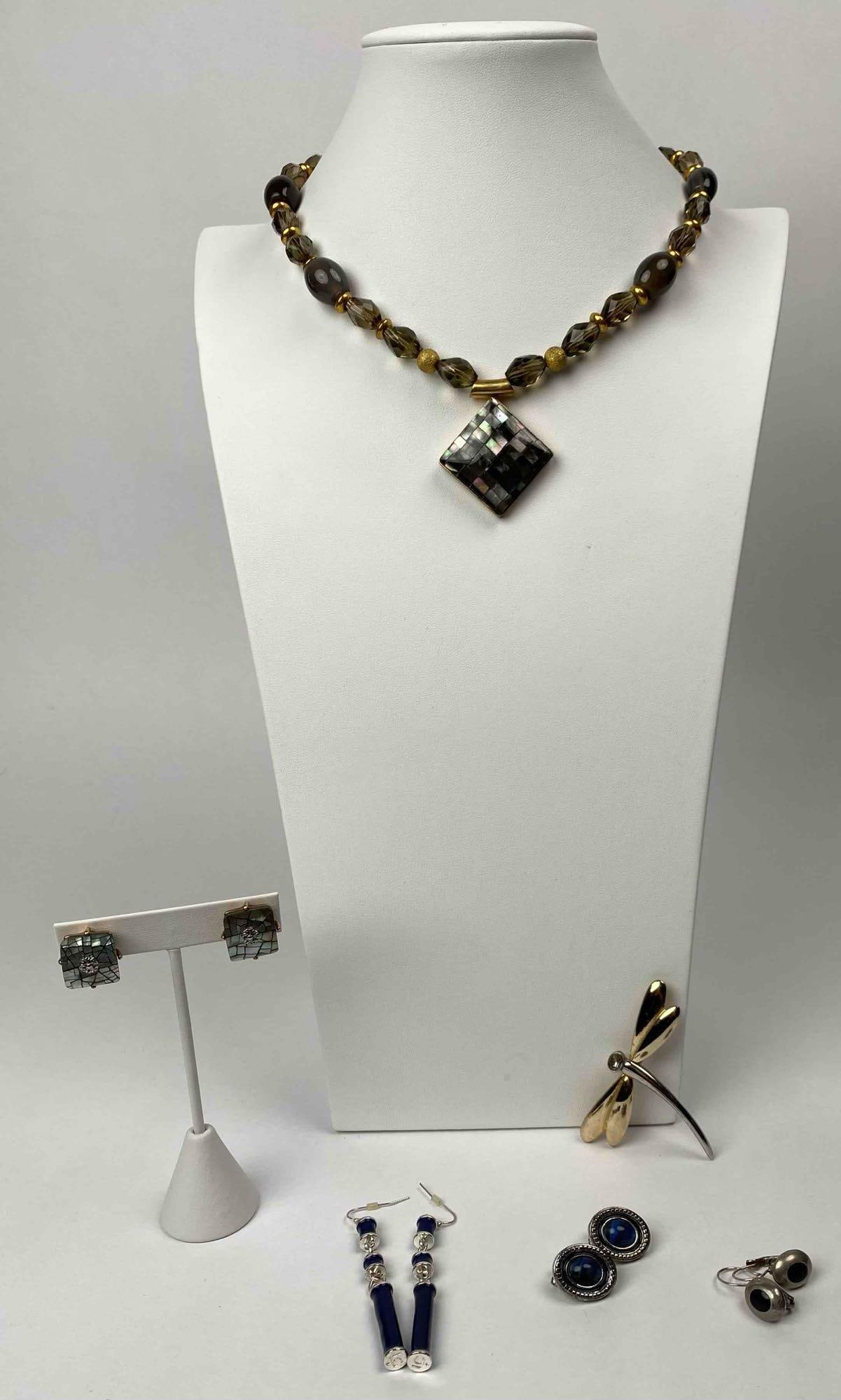 Vintage Liz Claiborne Jewelry: Liz Claiborne Jewelry. Lots are in good to excellent condition. Please see photos for additional details. Necklace Length: 18" Dragonfly: 2.75" Clip-on Earrings: 0.75" Drop Earrings: 1" Dangle Earring