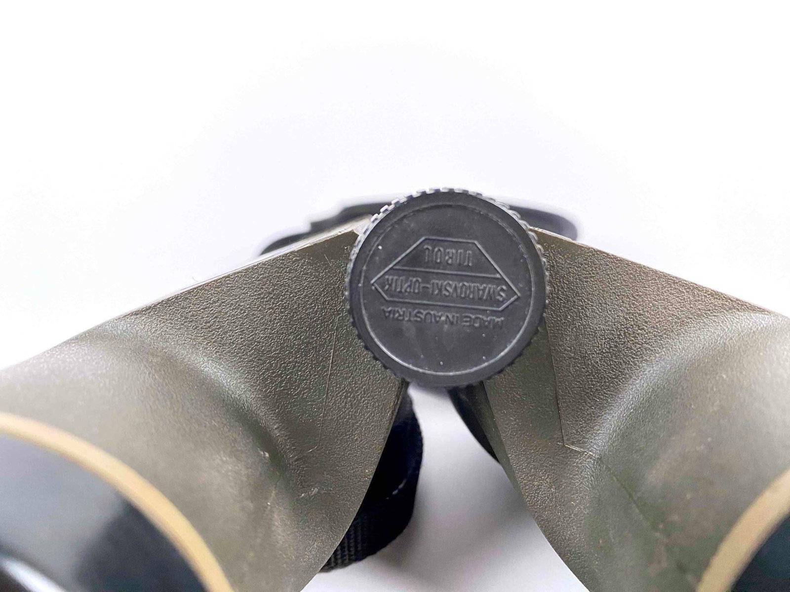 Swarovski Optik Habicht SL 10×40 Binoculars with Strap: These binoculars are Swarovski Optik Habicht SL with 10 X 40 magnification. They are an army green with black trim. The binoculars includes a Swarovski Optik camera strap adorned with two silver eagle